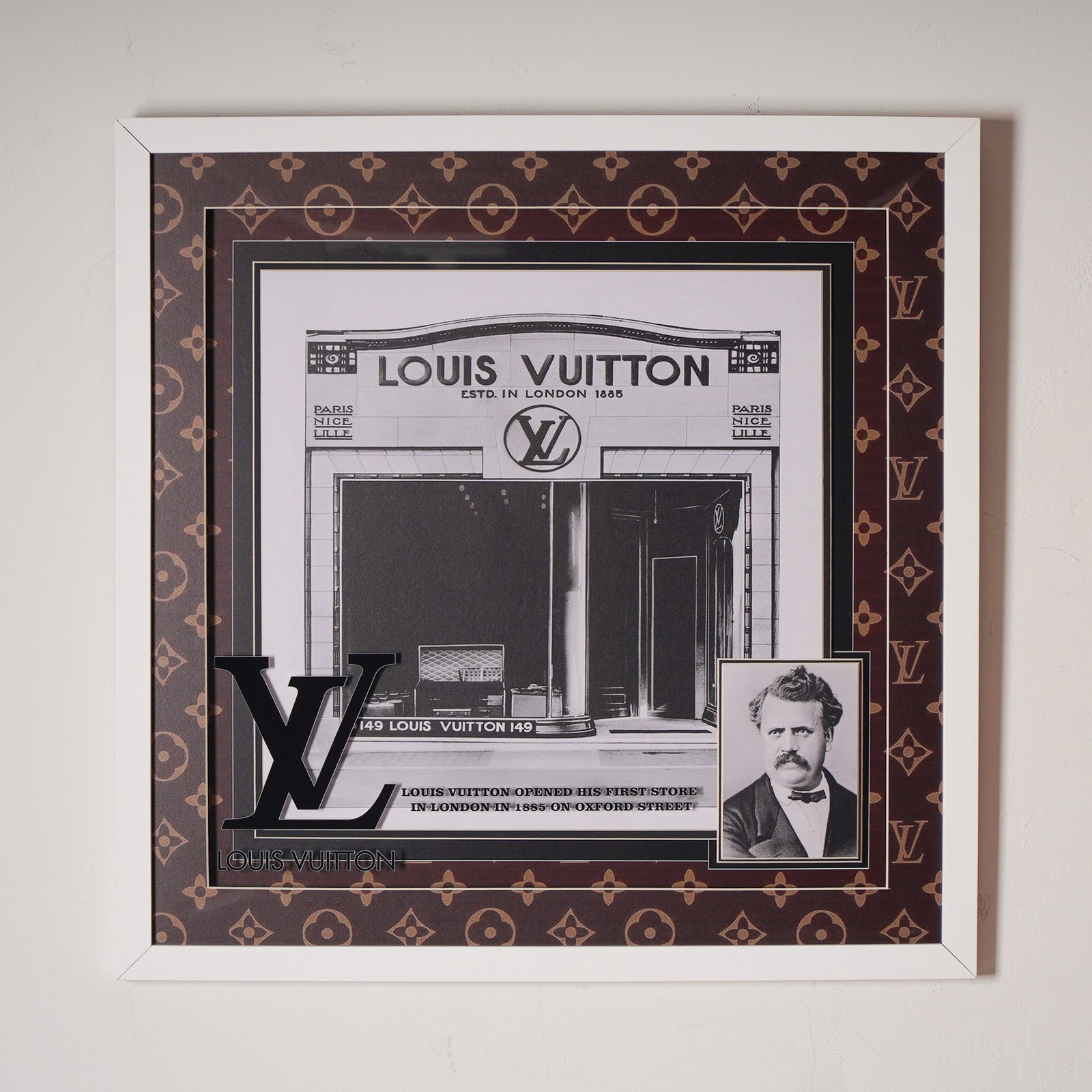 Louis Vuitton Framed Shadowbox with 1855 Oxford Street Store and Portrait: Framed shadowbox featuring a black and white historical image of the first Louis Vuitton store on Oxford Street in 1855, accompanied by a portrait of Louis Vuitton in the corner. This elegant display 
