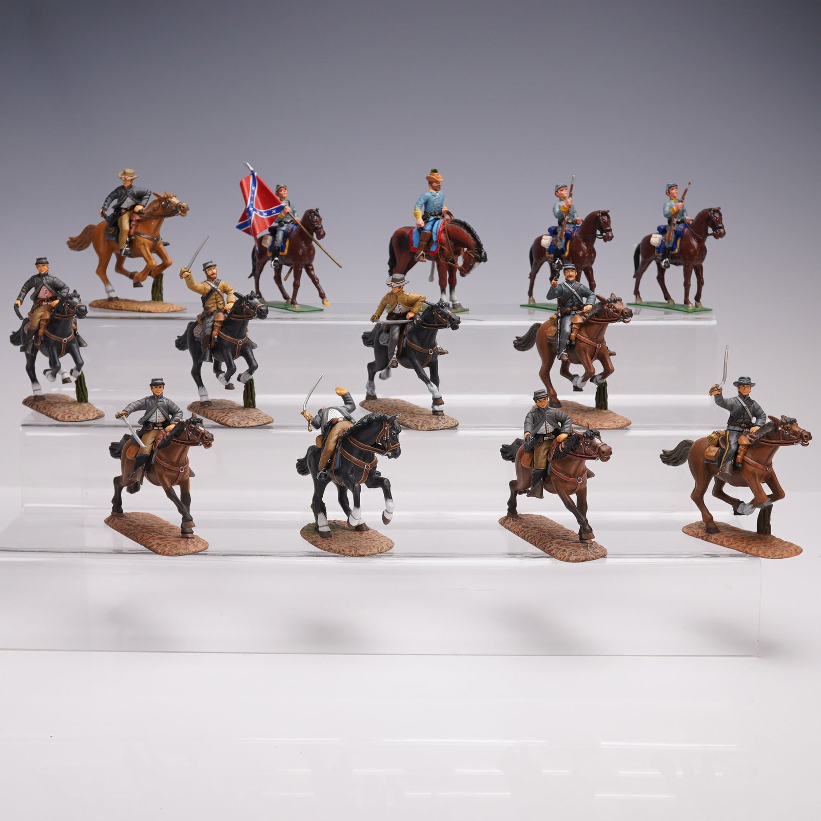 22pc American Confederate Cavalry Soldiers Miniature Figurines: 22 hand-painted miniature figurines representing Confederate cavalry soldiers from the American Civil War era. The group includes mounted figures in a variety of poses, with most riders designed to be