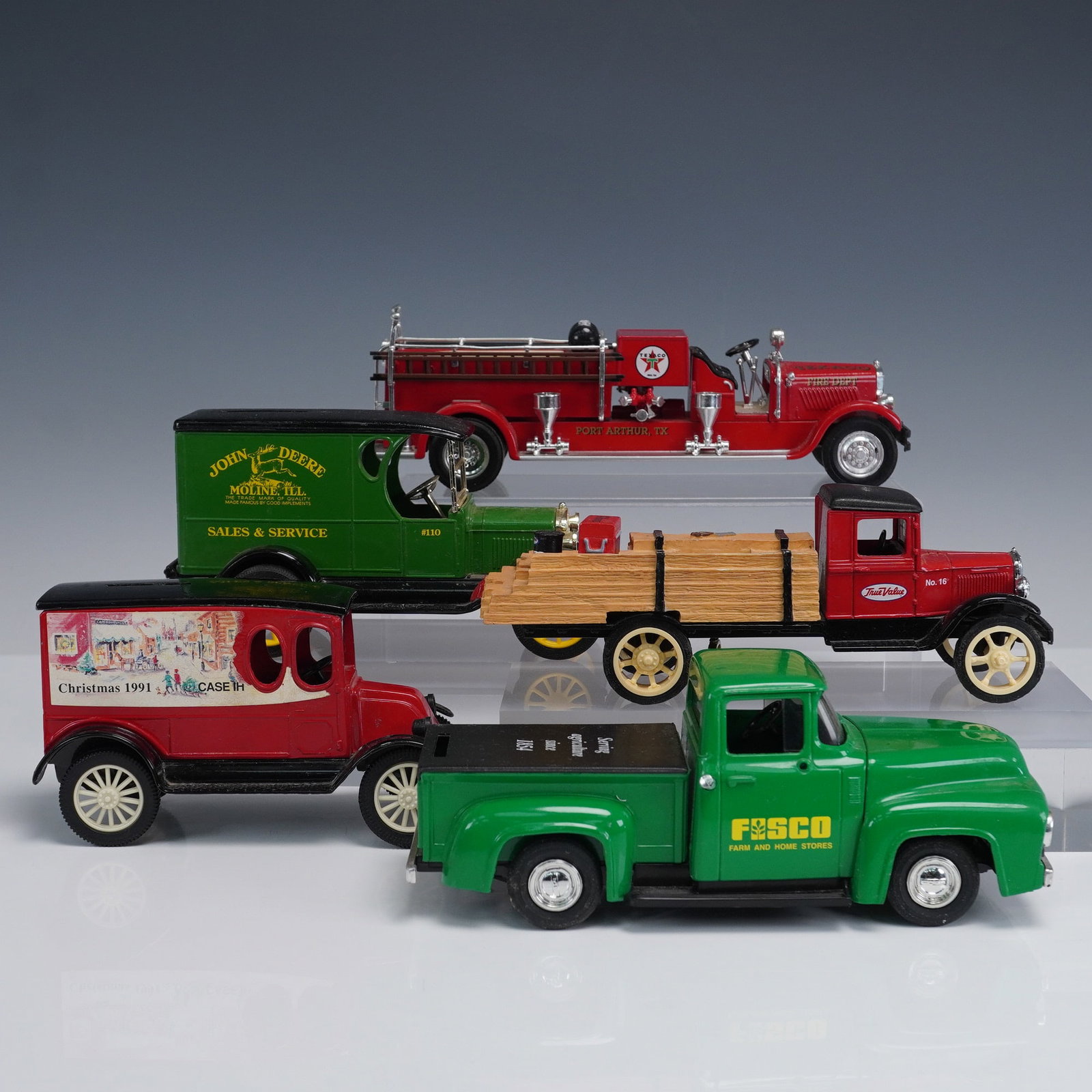 5pc Die Cast Truck Bank Lot Texaco John Deere Frisco: Five piece die cast metal advertising truck bank lot featuring classic vehicle styles with painted logos and coin slots, including a Texaco Port Arthur TX 1930s-style fire engine with chrome ladders, 