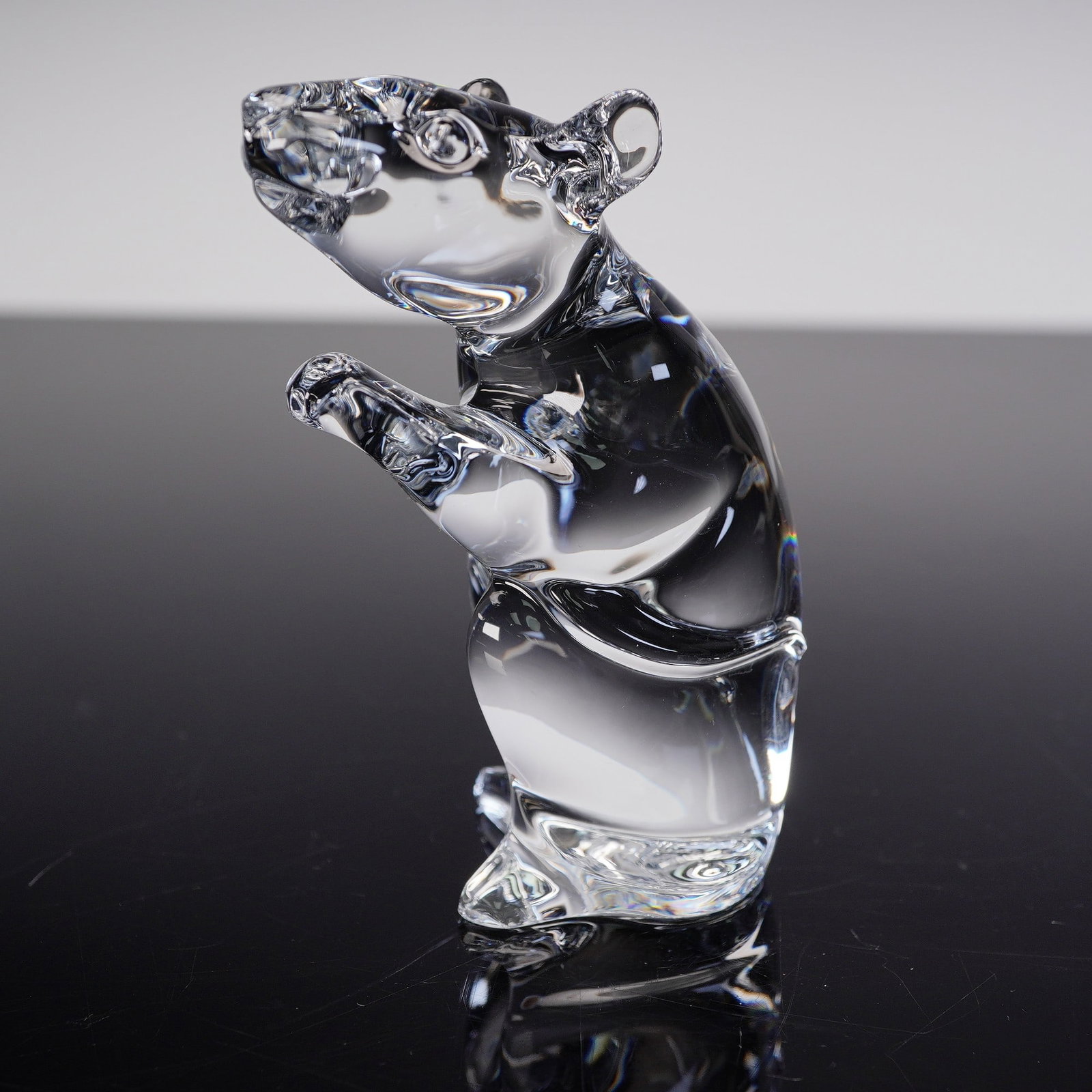 Baccarat Crystal Figurine, Zodiac Mouse, Year of the Rat: Clear crystal mouse figurine by Baccarat, France, is symbol for Zodiac Year of the Rat. Finely crafted with a smooth, modernist form and delicate detailing in the face and paws. The piece is signed on