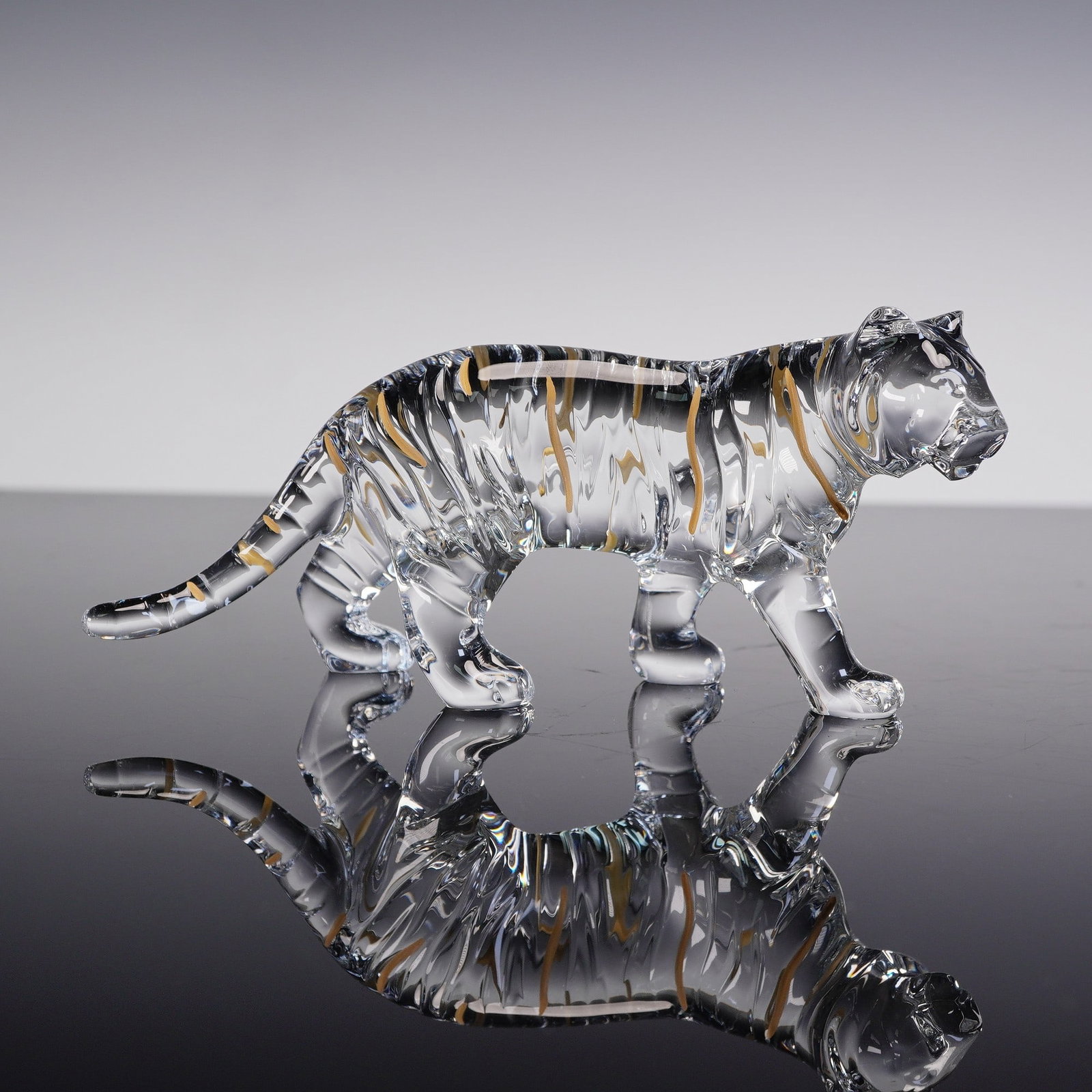 Baccarat Crystal Zodiaque Tiger 2022 Figurine by Allison Hawkes: Baccarat crystal Zodiaque Tiger 2022, designed by Allison Hawkes to celebrate the Chinese New Year and the Year of the Tiger. This radiant creation features a perfectly sculpted silhouette that captur