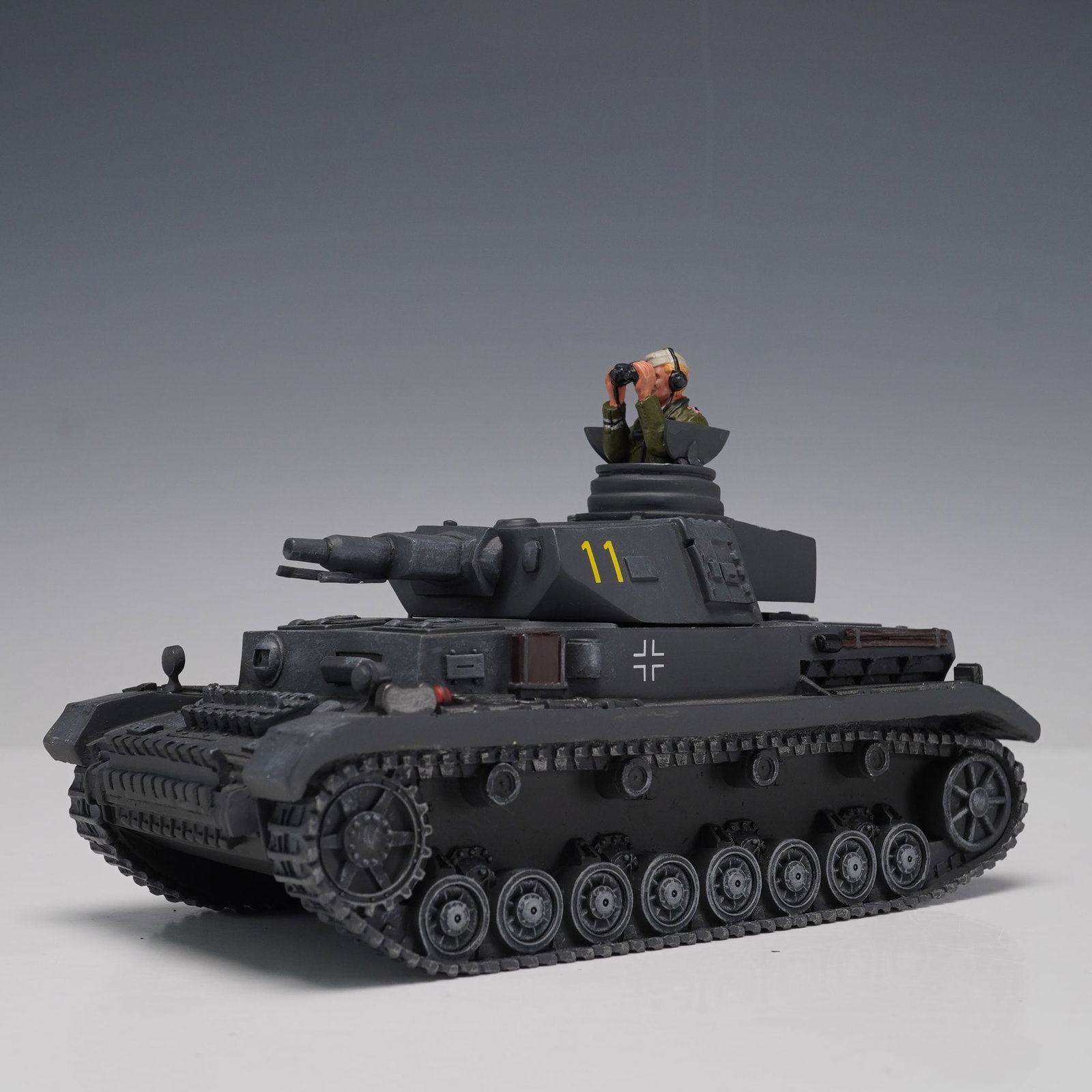 Britains 2003 Panzerkampfwagen IV Die-Cast Model Tank, Dark Gray: Britains die-cast Panzerkampfwagen IV military tank model, dated 2003, finished in matte dark gray with yellow tactical number 11. Features include molded tracks, turret-mounted figure with binoculars