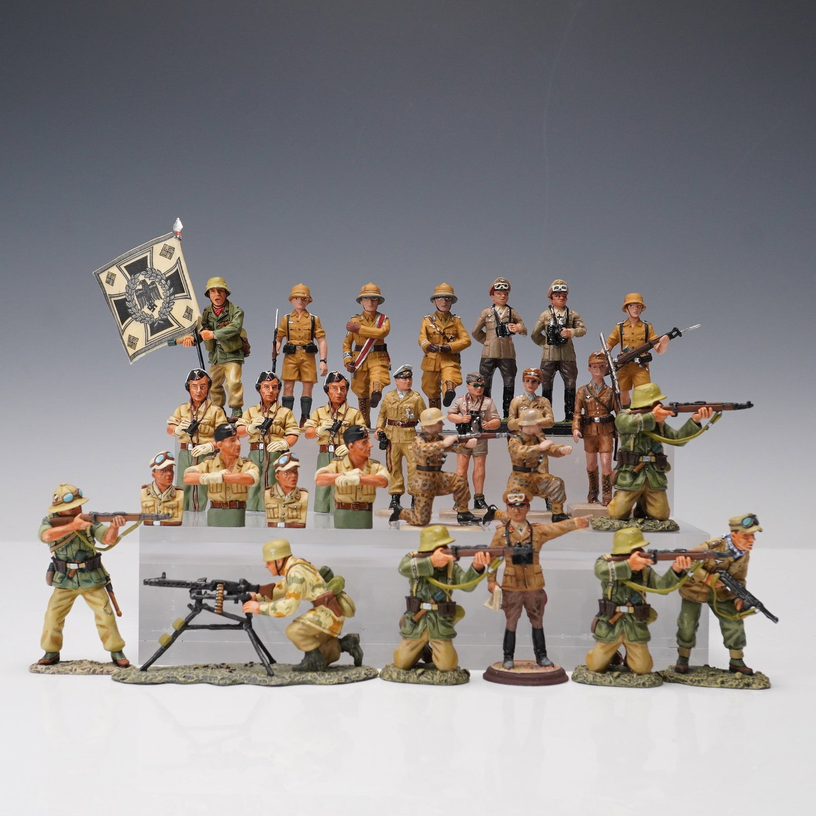 28pc King & Country Afrikakorps & Other WWII Axis Forces Toy Soldier Sets: A 28 piece collection of highly detailed, hand-painted military toy soldiers by King & Country and other makers, representing Axis troops in the North African theatre during World War II. The set feat