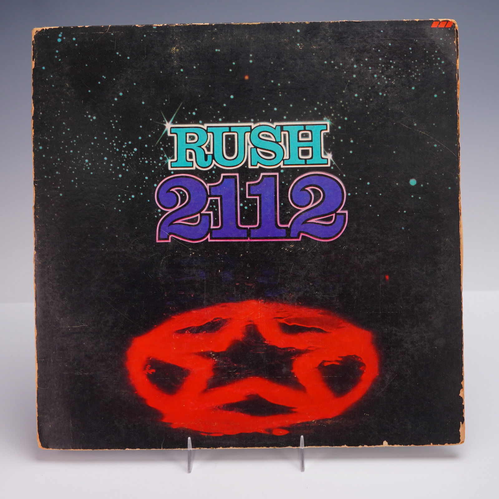 Mercury Records Rush Vinyl Record, 2112: An original 1976 Mercury Records stereo pressing of "2112" by Canadian progressive rock band Rush. This seminal studio album features the iconic seven-part title suite "2112" occupying the entirety of