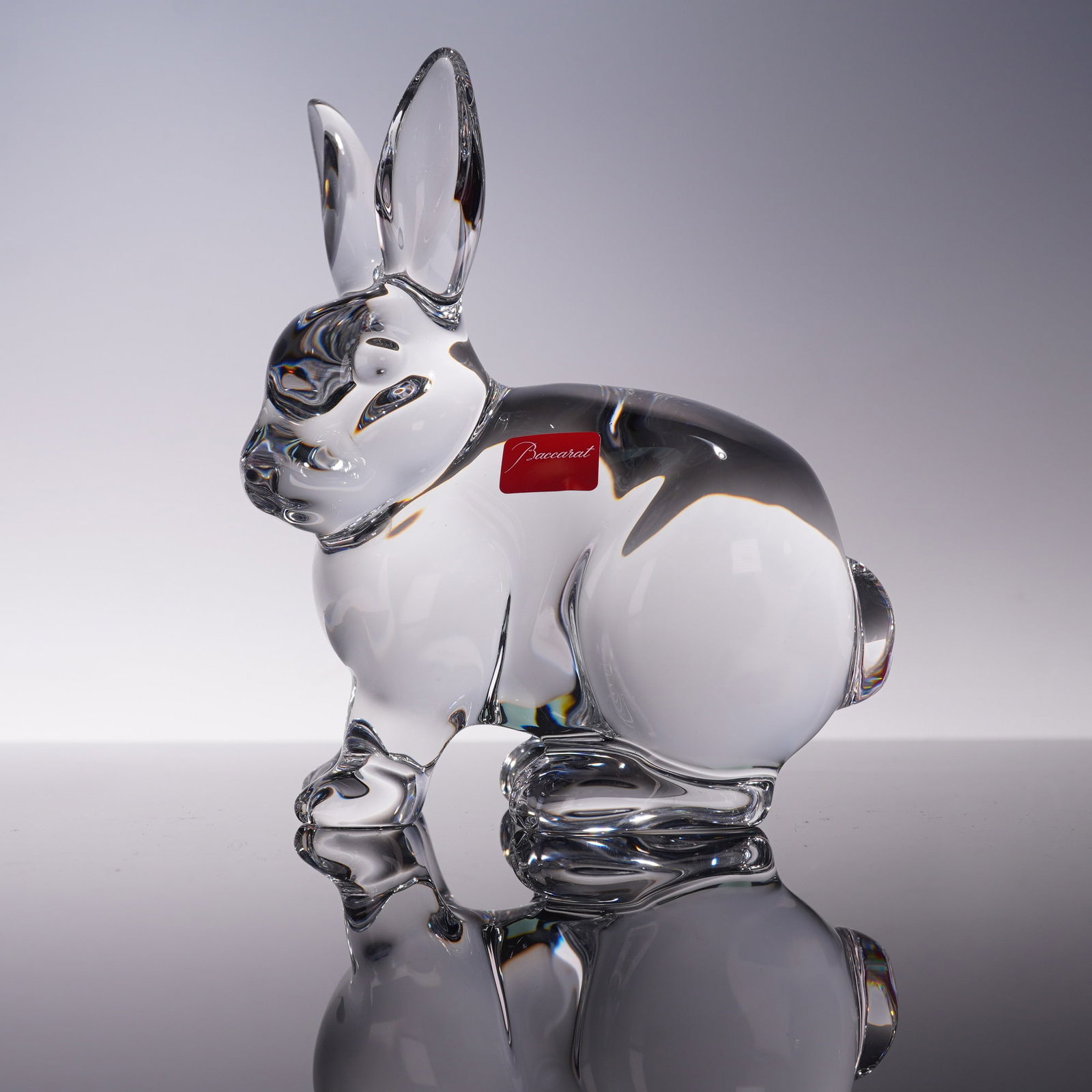 Baccarat Crystal Bellagio Rabbit Figurine: Baccarat France clear crystal Bellagio Rabbit figurine, beautifully crafted with smooth contours and lifelike detailing to the ears, face, and paws. Etched with the Baccarat backstamp and logo, and ac
