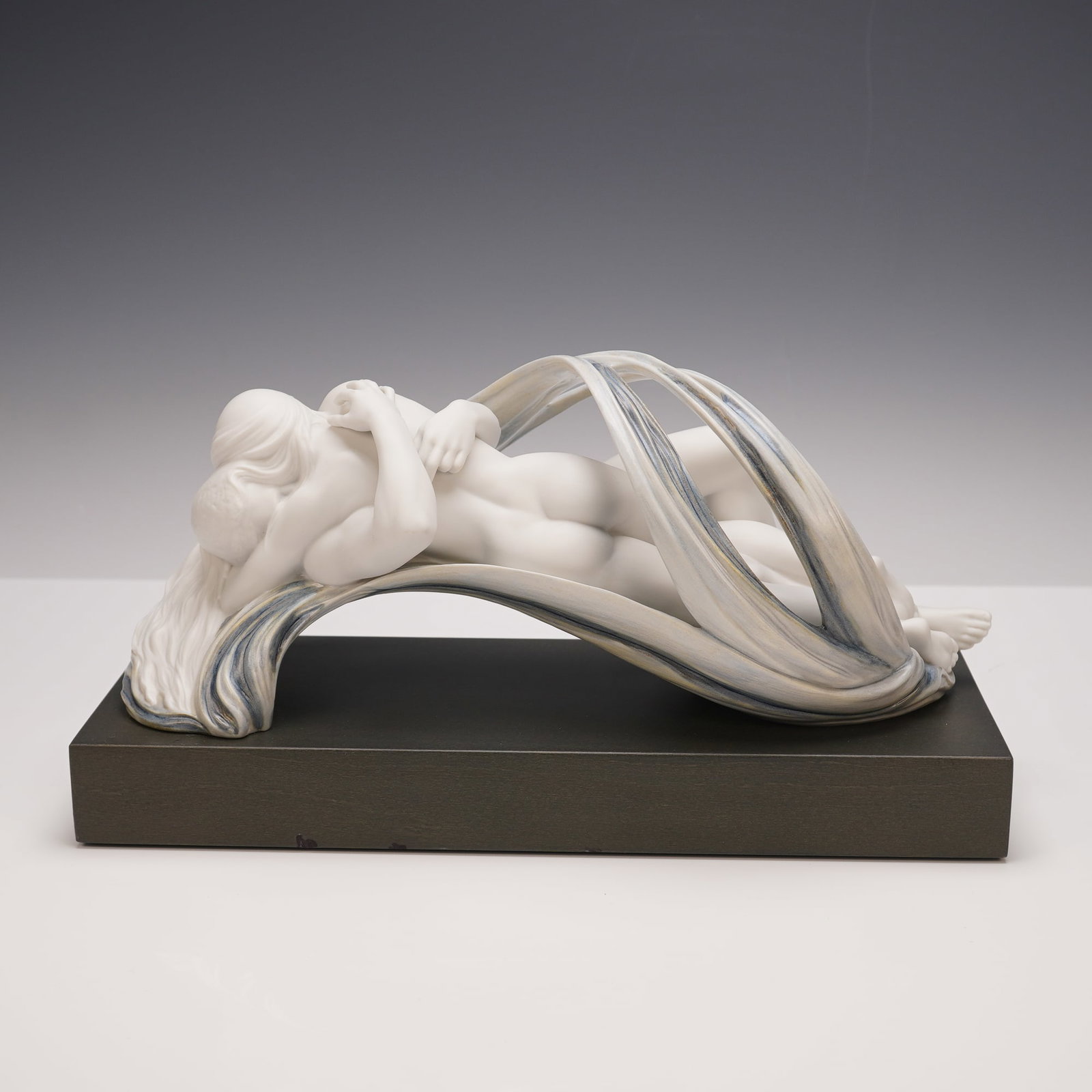 Lladro Porcelain Sculpture, Love and Desire 01018013: Exquisite Lladro porcelain sculpture titled Love and Desire (01018013), designed by renowned artist Ernest Massuet and issued in 2003. This striking work captures an intimate moment between two nude f