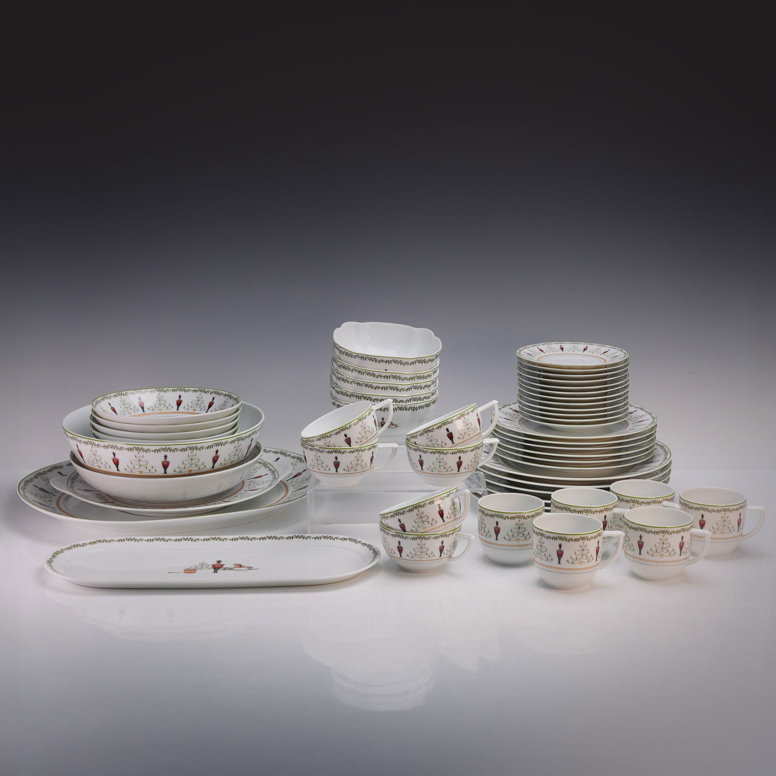 52pc Bernardaud Porcelain Dinnerware Set, Grenadiers, Happy Holiday: A fine 52 piece Bernardaud porcelain dinnerware set in the Grenadiers Happy Holiday pattern, designed by Terri McDermott and inspired by the Nutcracker ballet. The set includes 6 coffee cups, 6 tea cu