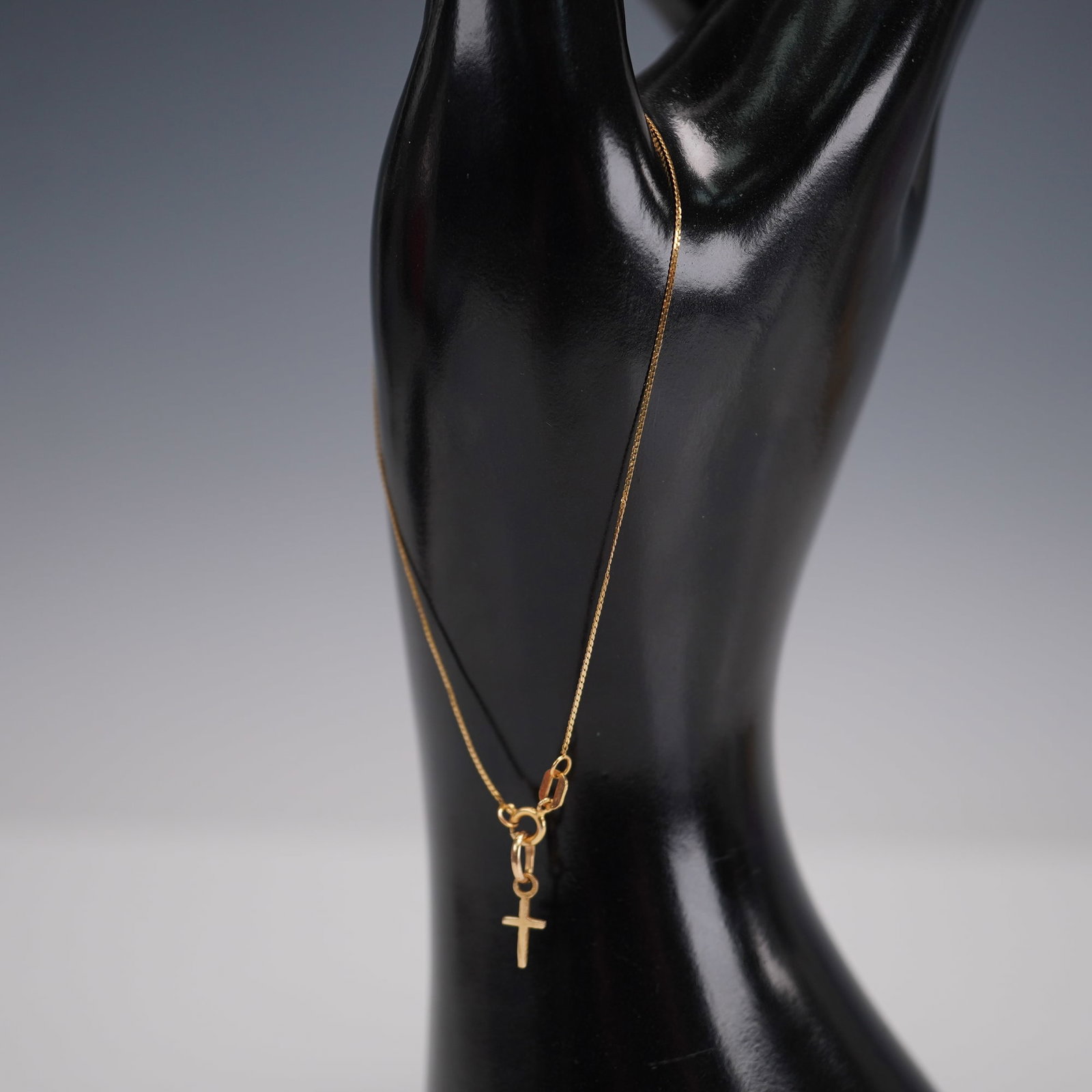 Italian 14K Gold Infant Cross Bracelet: A petite Italian 14K yellow gold bracelet designed for an infant or young child, likely intended as a christening or baptismal gift. The fine box chain is fitted with a miniature gold cross charm and 