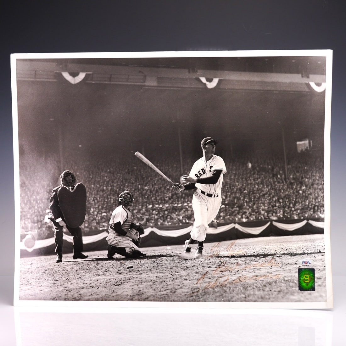 Ted Williams Signed At Bat Photo - PSA Certified: Offered is a stunning Black and White photograph titled "Ted Williams at Bat", personally signed in the lower right corner with the inscription: "Best Wishes, Ted Williams". This iconic image captures