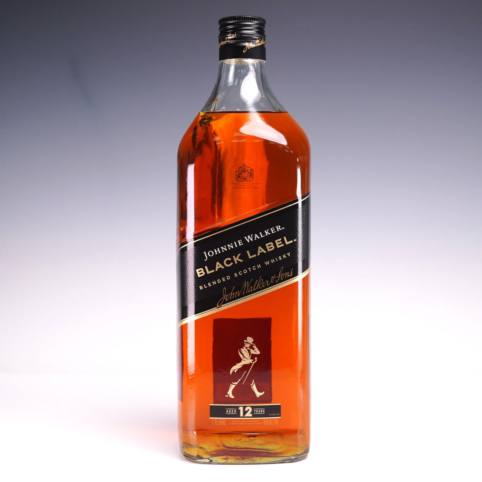 Johnnie Walker Black Label Blended Scotch Whisky, 1.75L, 80 Proof: A full-size 1.75-liter bottle of Johnnie Walker Black Label blended Scotch whisky, aged 12 years. This iconic expression from John Walker & Sons is celebrated for its smooth character, balancing deep
