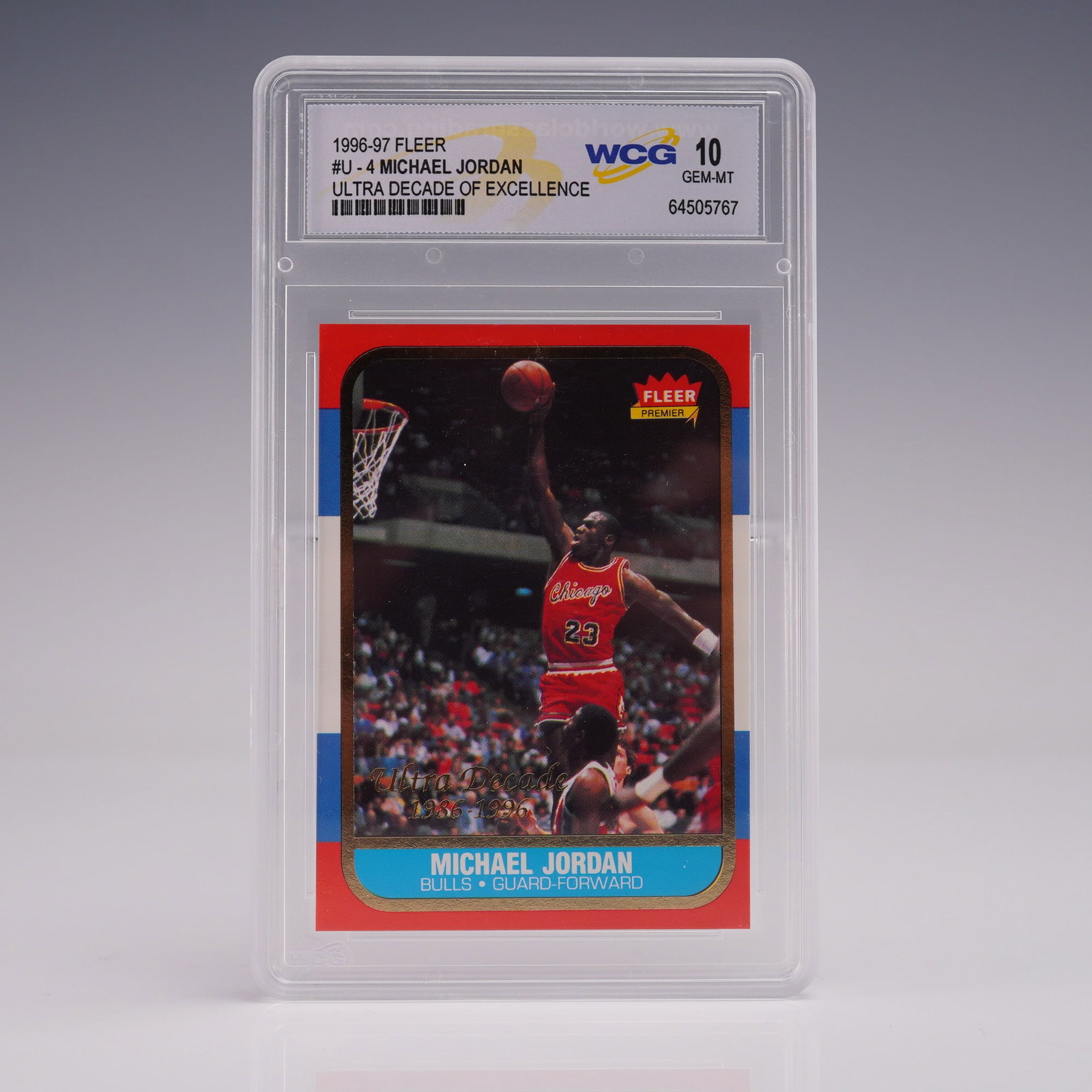 1996-97 Fleer Decade of Excellence #4 Michael Jordan WCG Gem Mint 10: This 1996-97 Fleer Decade of Excellence #4 Michael Jordan insert card, graded Gem Mint 10 by WCG (World Class Grading), celebrates Jordan's legendary return and decade-long dominance in the NBA. The c