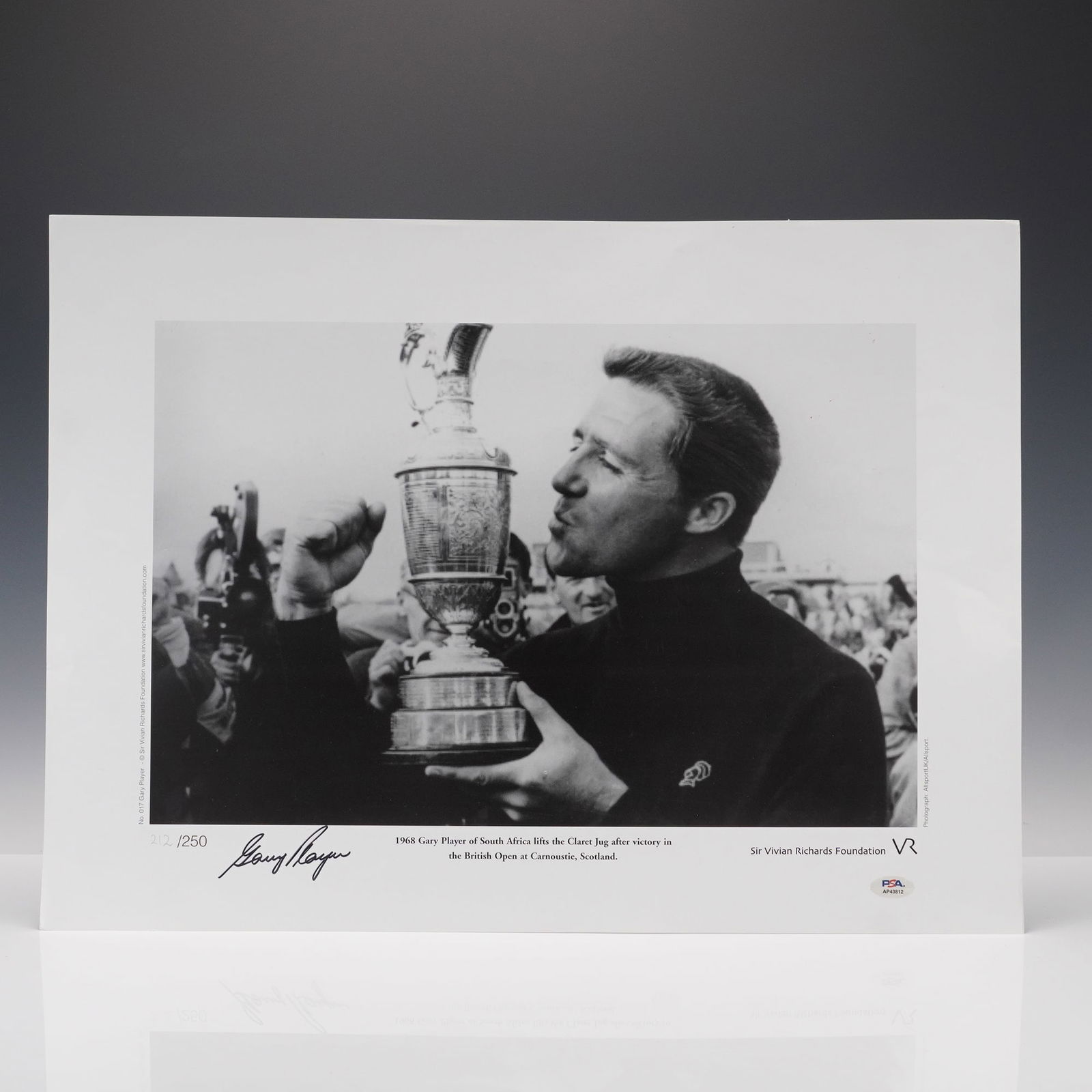 Gary Player, 1968 British Open Champion, Signed Ltd. Ed. Photo PSA Cert.: Black and white photograph depicting Gary Player of South Africa kissing the Claret Jug after his victory in the 1968 British Open at Carnoustie, Scotland. Numbered 212/250 and bearing Player's bold s