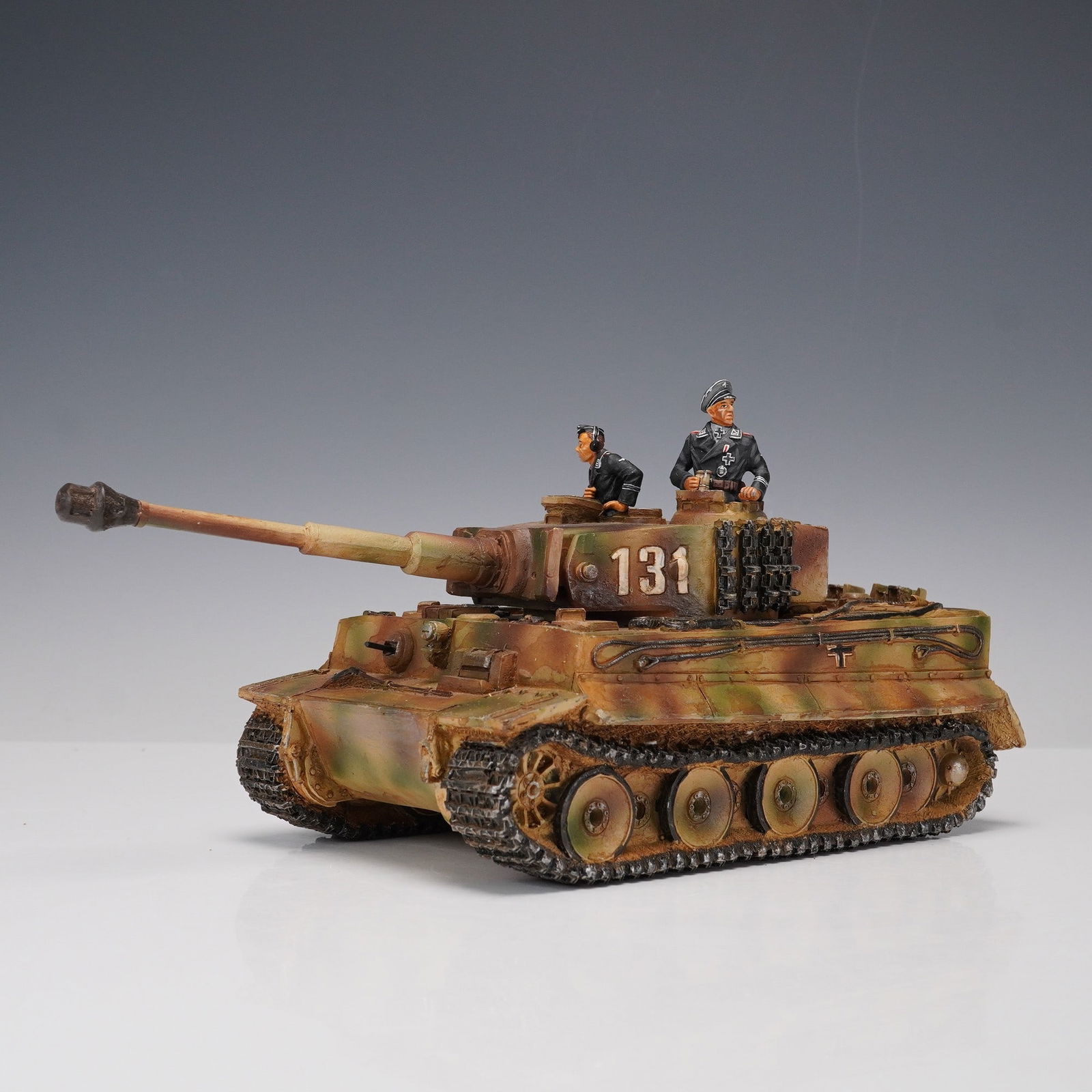 King & Country Tiger I Tank Model: King & Country 1:30 scale hand-painted metal model of the German Tiger I Heavy Tank, Set WS067, representing Tank 131 from the Normandy 1944 campaign. The model features realistic weathered camouflage