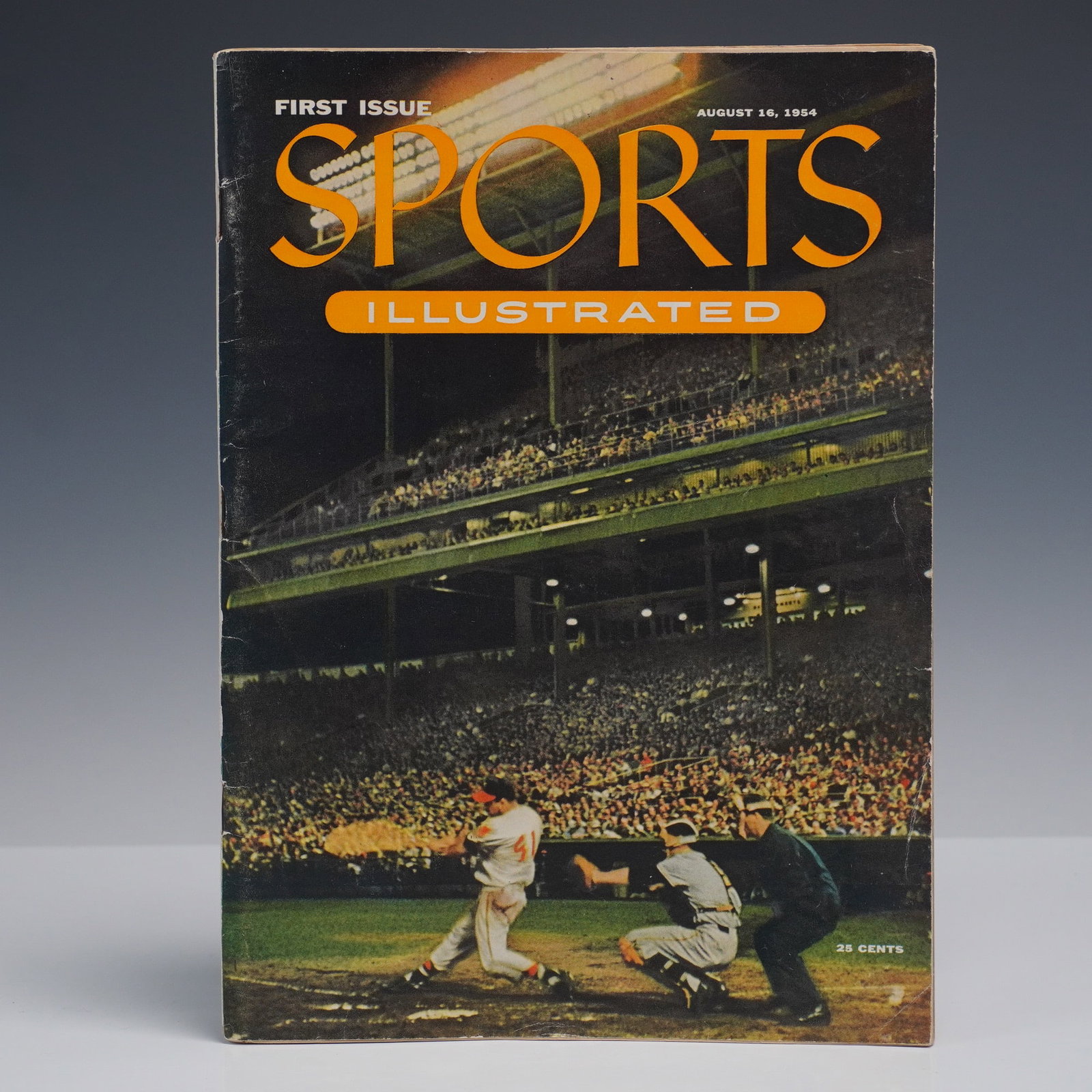 1954 1st Issue of Sports Illustrated Magazine: Original first issue of Sports Illustrated magazine, dated August 16, 1954. The front cover features a color photograph of Milwaukee Braves third baseman Eddie Mathews at bat, with New York Giants cat