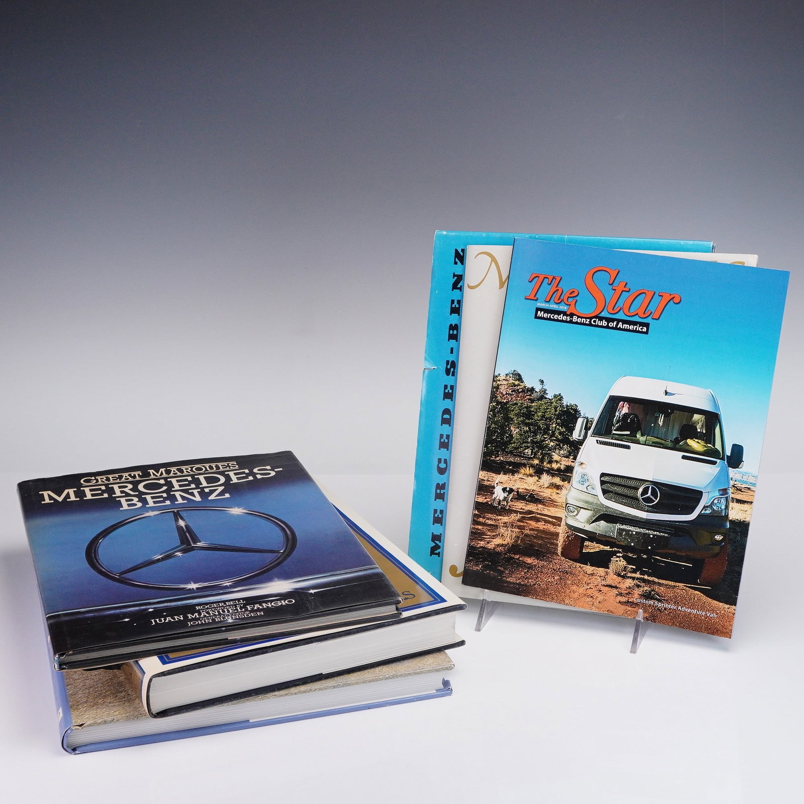 6pc Mercedes-Benz Books and Club Publications: Collection of six automotive titles focused on Mercedes-Benz history, design, and performance. Includes The Ultimate History of Mercedes-Benz, Mercedes-Benz 300 SL by W Robert Nitske, Great Marques: M