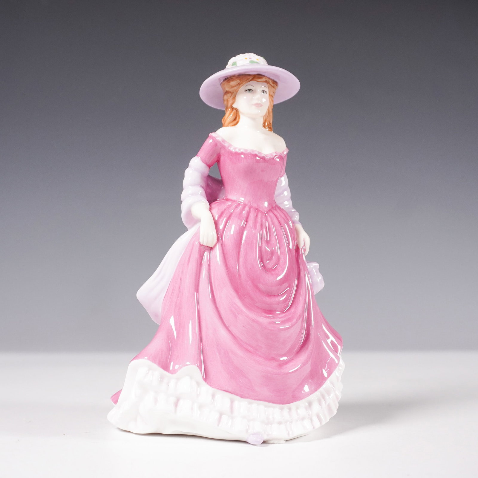 Royal Doulton Bone China Figurine, Summer Breeze HN 4587: Royal Doulton figurine Summer Breeze, exclusively produced for the Royal Doulton International Collectors Club to commemorate its 25th anniversary 1980-2005. This bone china figurine, features a grace