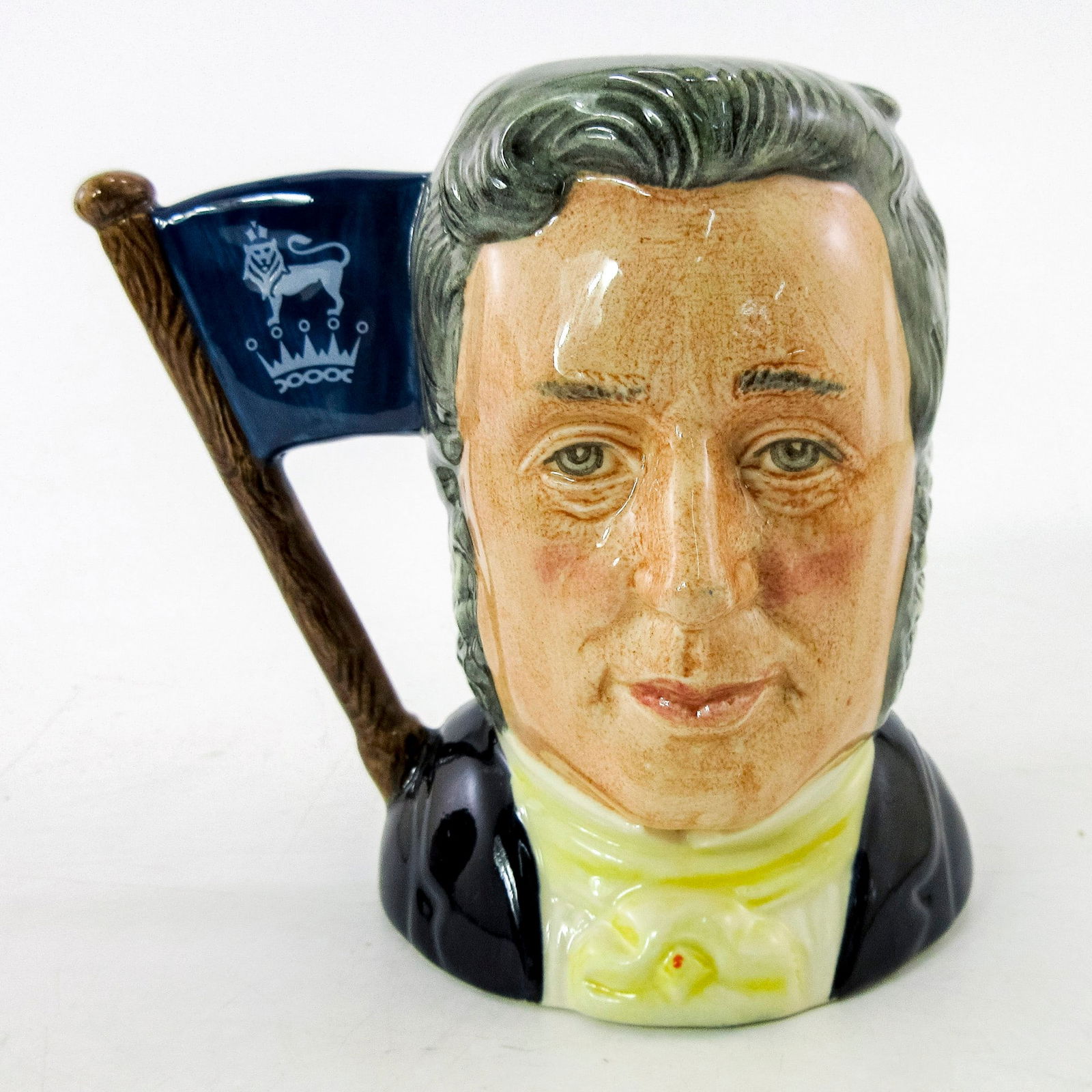 Sir Henry/Michael Doulton - Royal Doulton Jug: Large. Henry- Grey hair; yellow cravat; Michael- Brown hair; dark blue suit; white shirt; light blue tie. This two-faced jug was a special edition jug issued to mark Michael Doulton's personal appeara