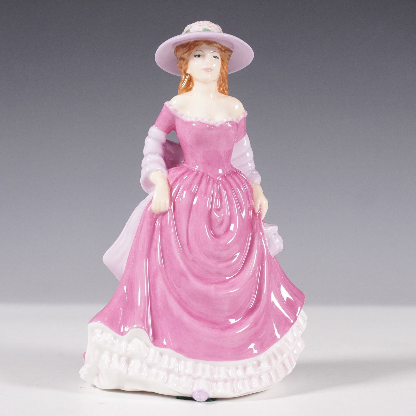 Royal Doulton Bone China Figurine, Summer Breeze HN 4587: Royal Doulton figurine Summer Breeze, exclusively produced for the Royal Doulton International Collectors Club to commemorate its 25th anniversary 1980-2005. This bone china figurine, features a grace