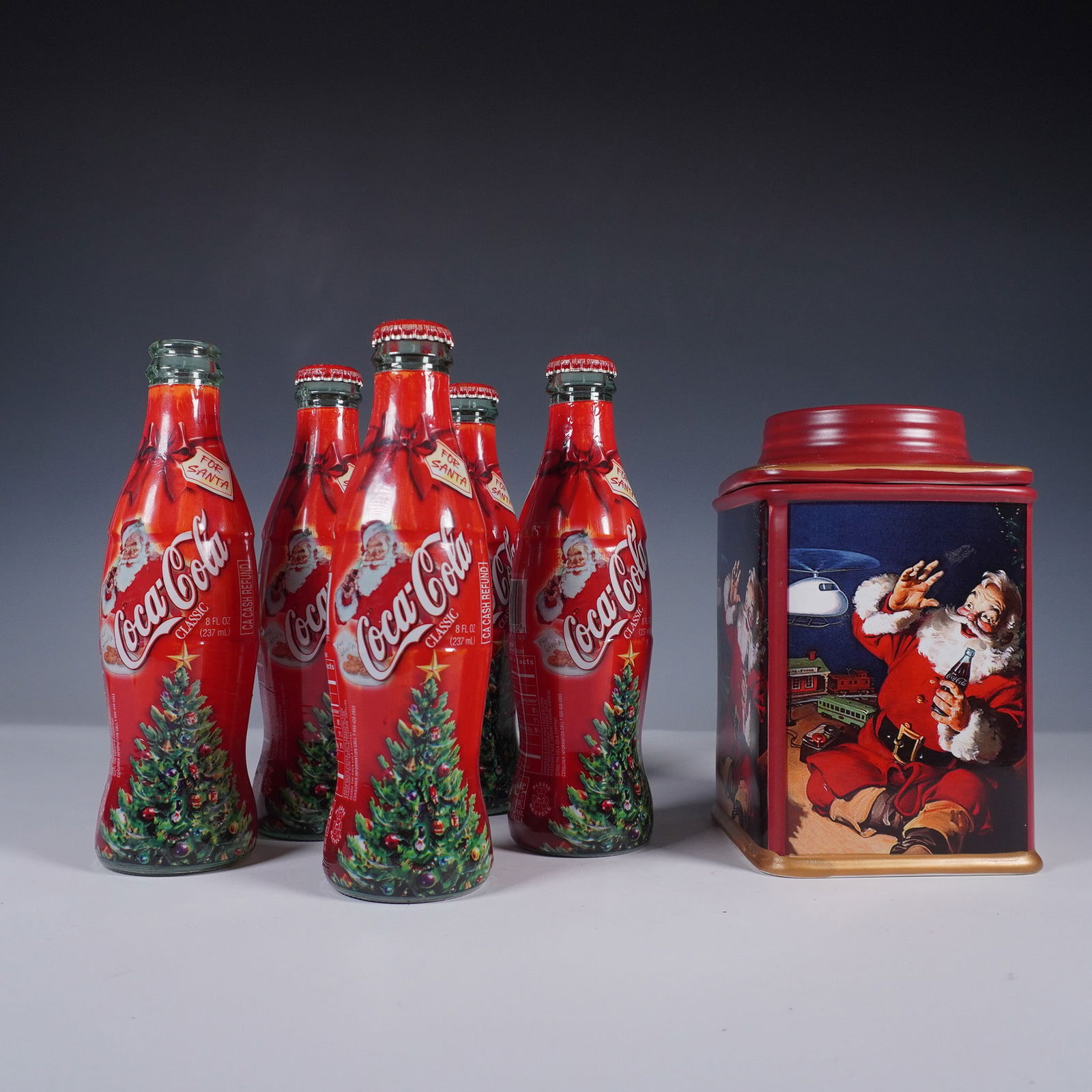 6pc Coca-Cola Christmas Bottles and Santa Canister (1 of 7)