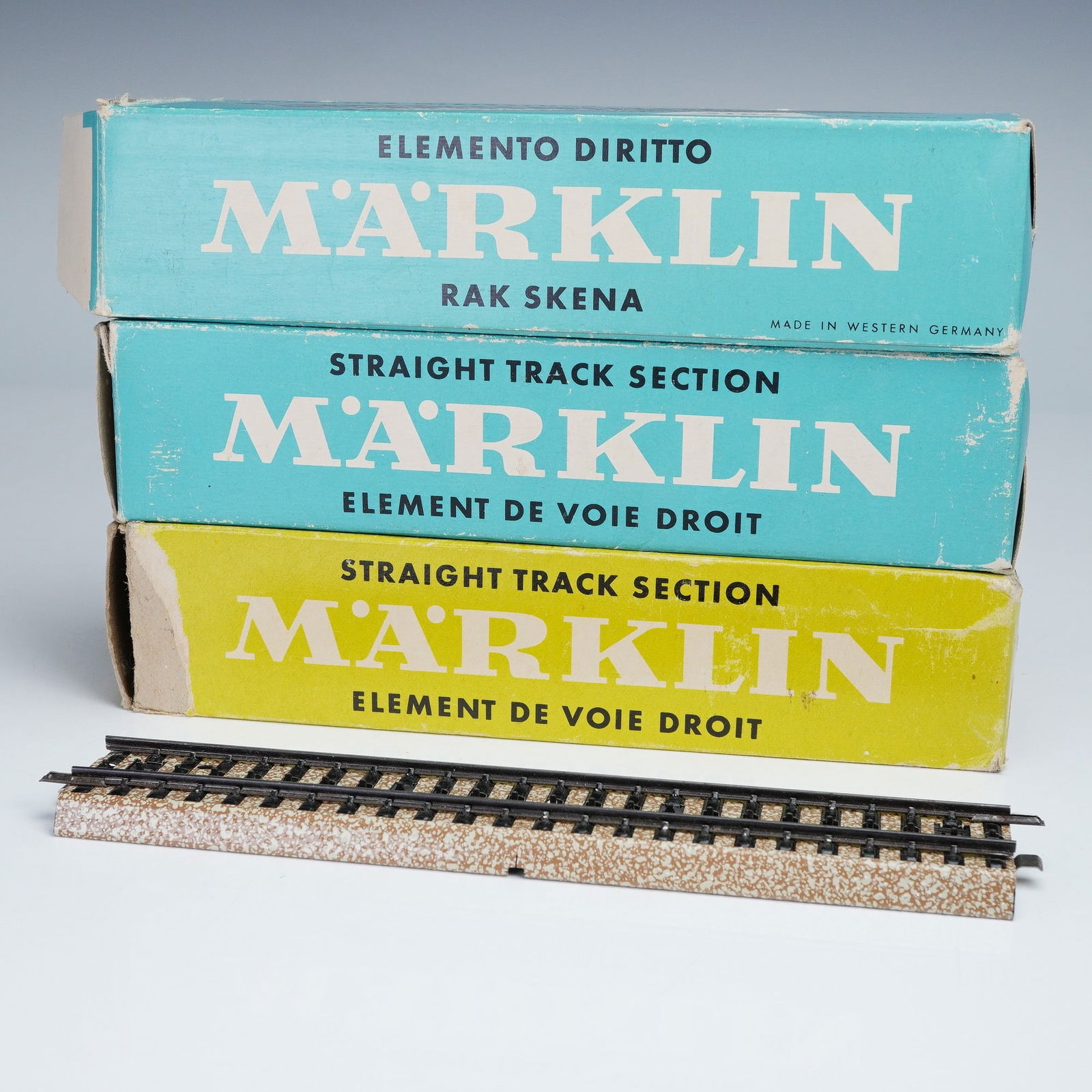 3pc Vintage Marklin Straight Track Sections: This lot includes three original boxes of Marklin straight track sections, a classic addition for vintage model railway enthusiasts. Each track section features the traditional metal roadbed with real