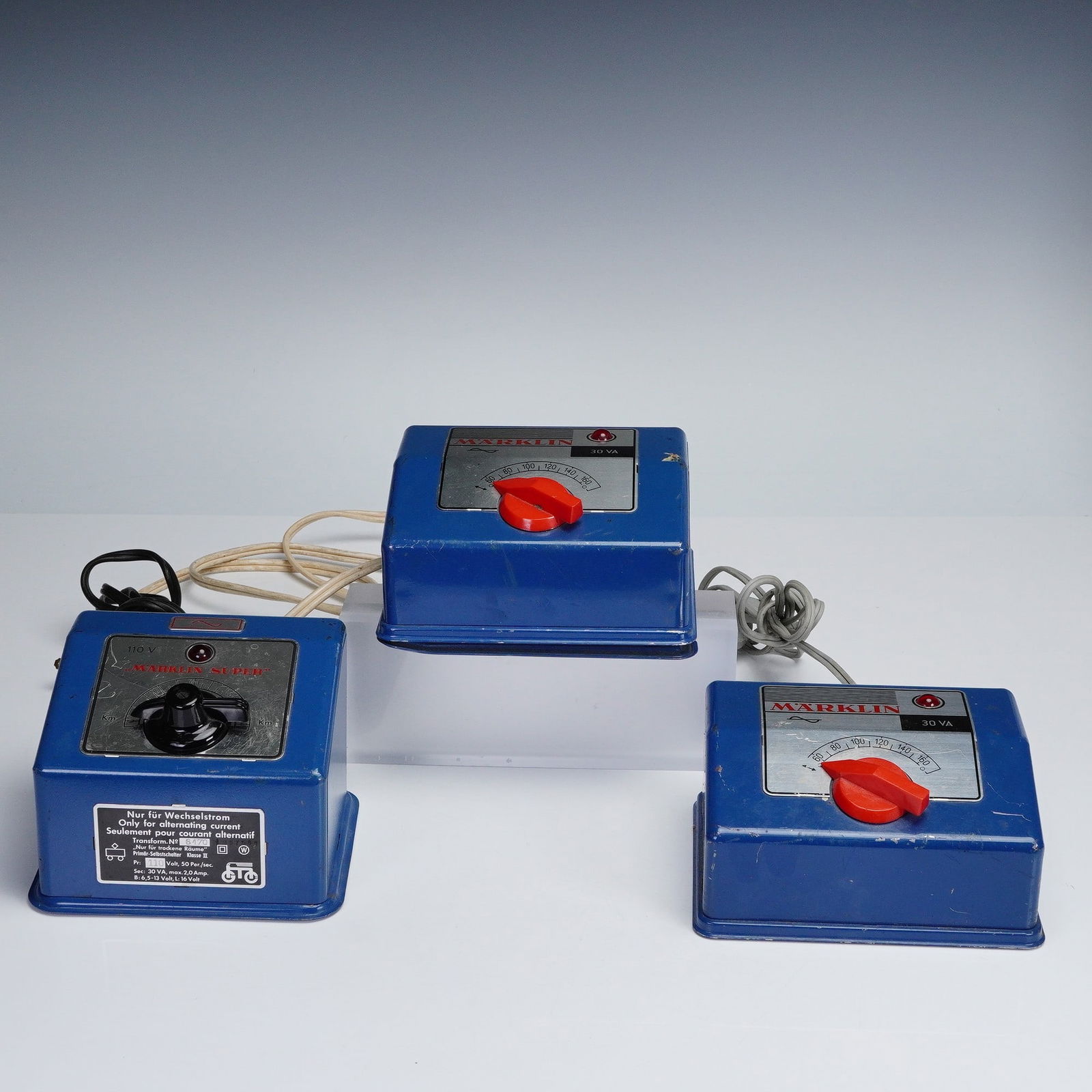 3pc Vintage Marklin Train Controllers: This lot offers a set of three vintage Marklin train controllers, all marked "Made in Western Germany" reflecting their mid-20th-century origin and quality craftsmanship. Finished in classic Marklin b