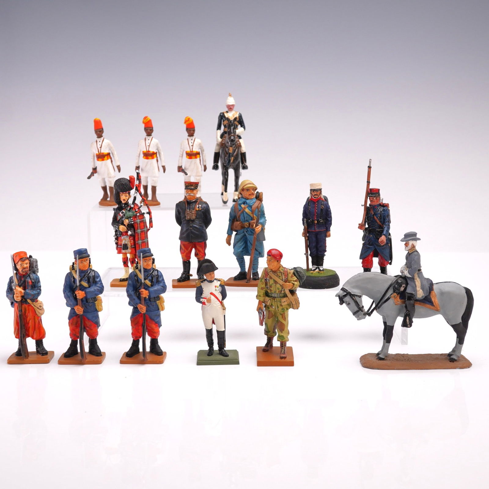 15pc Assorted French Military Toy Soldiers, Mounted and Foot Figures: Group of 15 hand-painted toy soldiers depicting various historical French military uniforms and regiments, including foot soldiers, officers, and mounted figures. Highlights include a mounted General