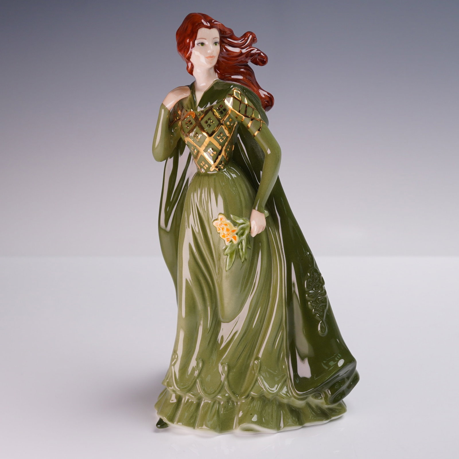 Coalport Figurine Lady Lismore Home Shopping Exclusive 2006: Coalport fine bone china figurine titled Lady Lismore, issued in 2006 as a Home Shopping Exclusive. This hand-decorated piece features a red-haired lady in a richly detailed green gown with gold-accen