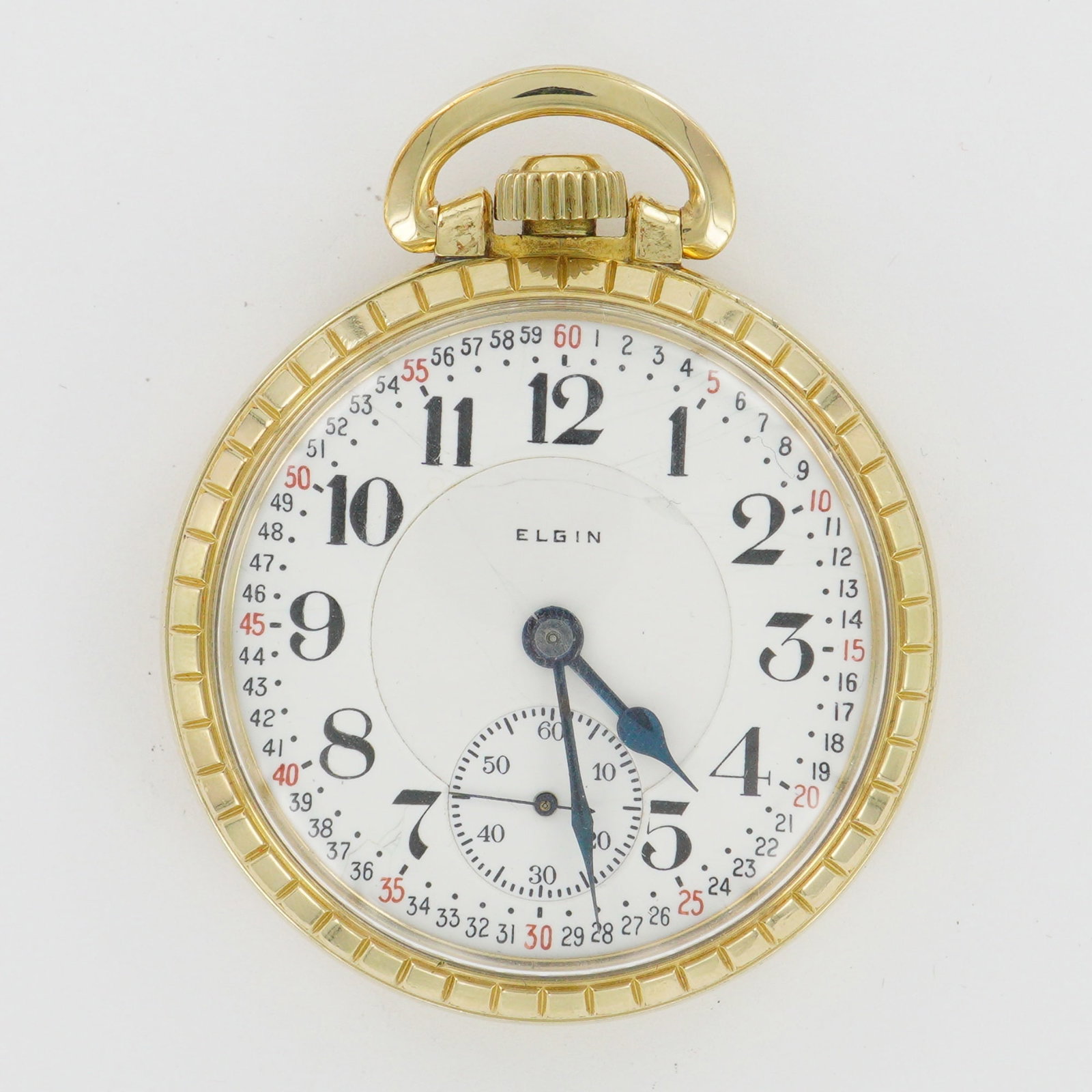 Elgin National Watch Co. Montgomery Dial 10k Rolled Gold Plate Pocket Watch: This Elgin National Watch Co. B.W. Raymond pocket watch showcases a Montgomery dial with bold black Arabic numerals, outer red 5-minute markers, and blued spade hands, paired with a recessed seconds s