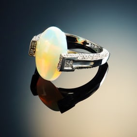 14K White Gold Ring with 3.86ct Opal and 0.75ct Diamond Accents