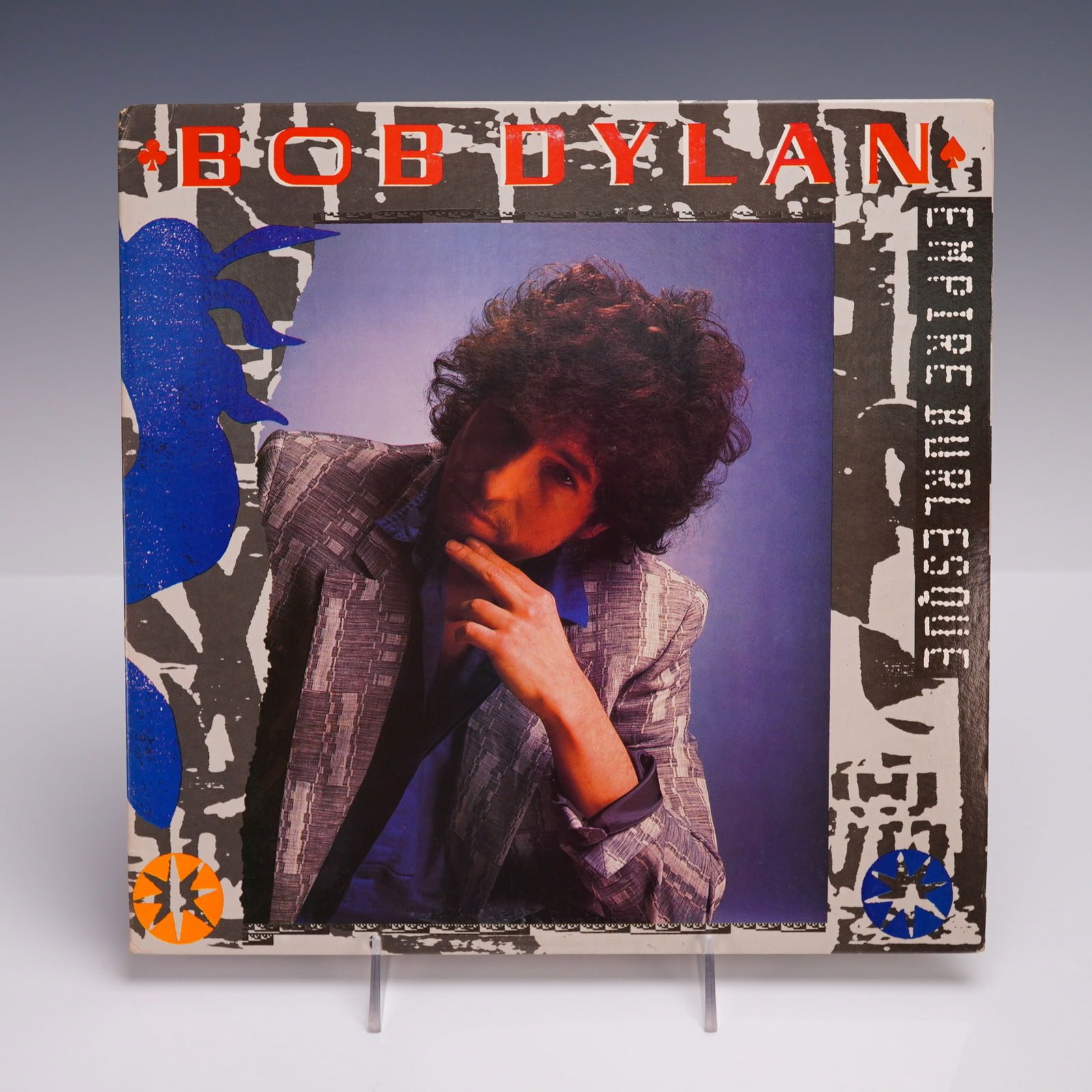 Columbia Records Bob Dylan Vinyl Record, Empire Burlesque: Original U.S. pressing of Bob Dylan's Empire Burlesque LP, issued by Columbia Records in 1985. Record comes housed in its original printed inner sleeve containing full lyrics. This release features a