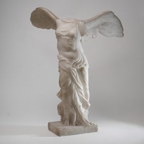 White Carved Stone Replica of the Winged Victory of Samothrace