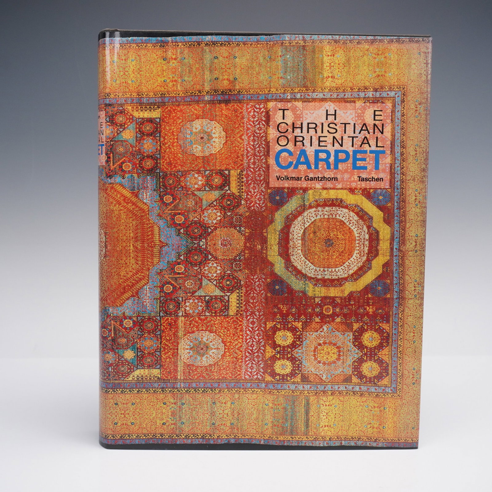 Volkmar Gantzhorn Hardcover Book, The Christian Oriental Carpet: This hardcover edition of The Christian Oriental Carpet by Volkmar Gantzhorn is a richly illustrated volume that explores the development of Christian Oriental carpet design from its origins through t