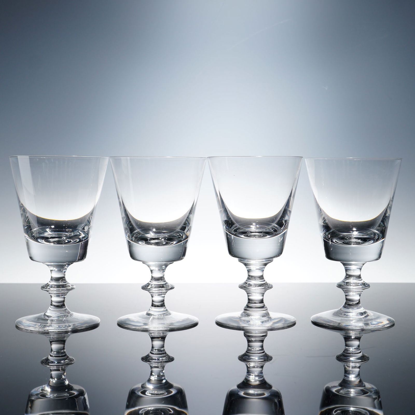 4pc Val St Lambert Crystal Water Goblets, State Plain: Offered here is a group of four Val St Lambert State Plain crystal water goblets, each marked on the underside. With their balanced proportions, sturdy stems, and crisp clarity, these goblets reflect