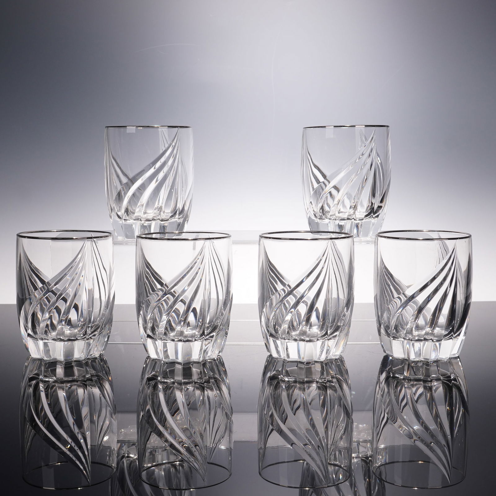 6pc Lenox Double Old Fashioned Glasses, Debut Platinum: This striking set of six Lenox double old fashioned glasses dazzles with a bold swirl design that catches and reflects the light beautifully. Each glass is accented with a sleek silver toned rim, addi