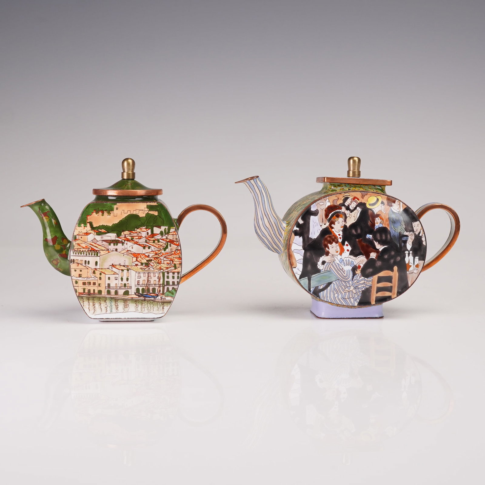 2pc Charlotte di Vita Enameled Miniature Teapots, Renoir & Klimt: A set of two Charlotte di Vita enameled miniature teapots, produced by Trade Plus Aid. This pair features hand-painted designs inspired by iconic artists: one depicts Pierre-Auguste Renoir's Dance at 