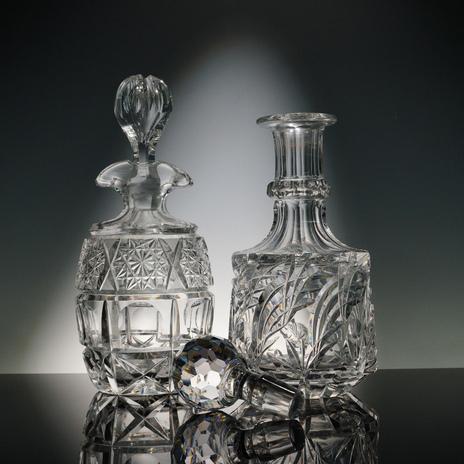 2pc Cut Crystal Decanter Set with Stoppers: This stunning 2-piece crystal decanter set features intricate cut glass designs with a brilliant sparkle. The set includes two decanters, each with a beautifully crafted stopper, ideal for adding eleg