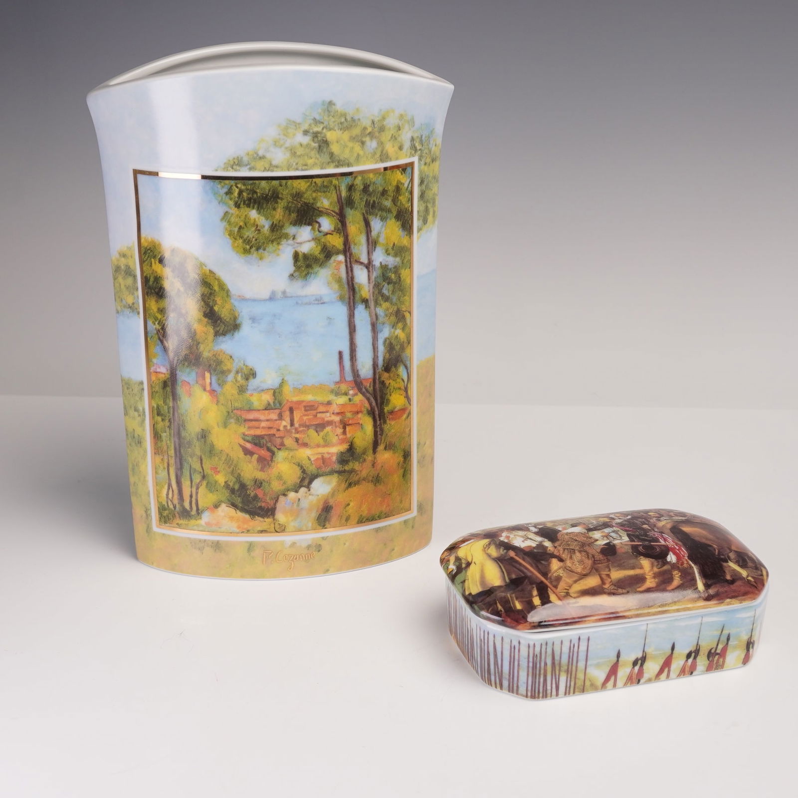 2pc Goebel and Giordano di Ponzano Porcelain Vase and Lidded Box: Lovely set comprising of two porcelain decor fine art, including a Goebel limited edition vase after Paul Cezanne's L'Estaque, rendered in vibrant enamels with gilt accents and numbered 10770 of 2000.