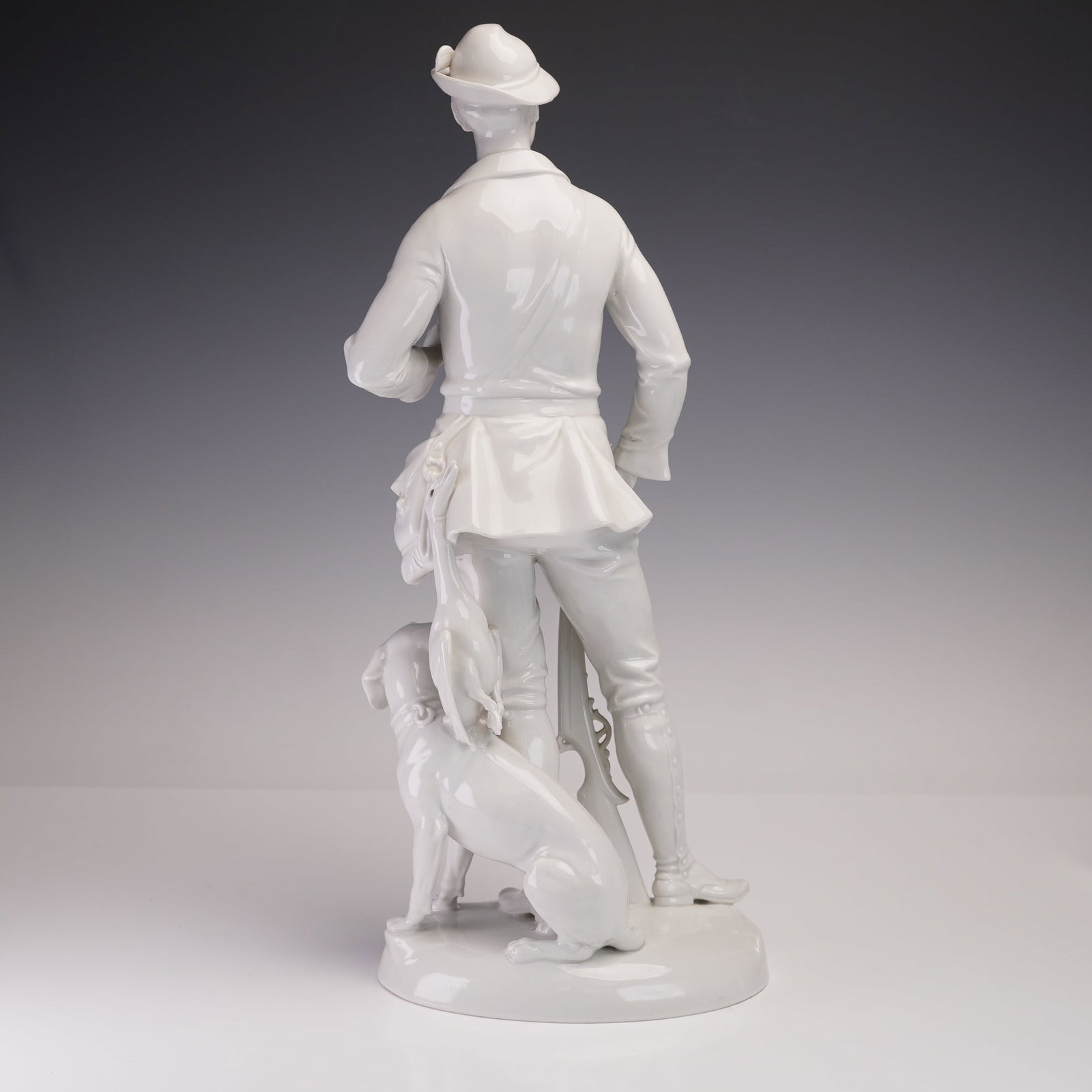 Rosenthal Porcelain Figurine, Hunter with Dog by Hugo Meisel: Porcelain figurine titled Hunter with Dog, designed by Hugo Meisel (1887-1966), produced by Rosenthal (Selb / Plossberg / Bavaria). Meisel, noted for his sculptural porcelain work, served on Rosenthal