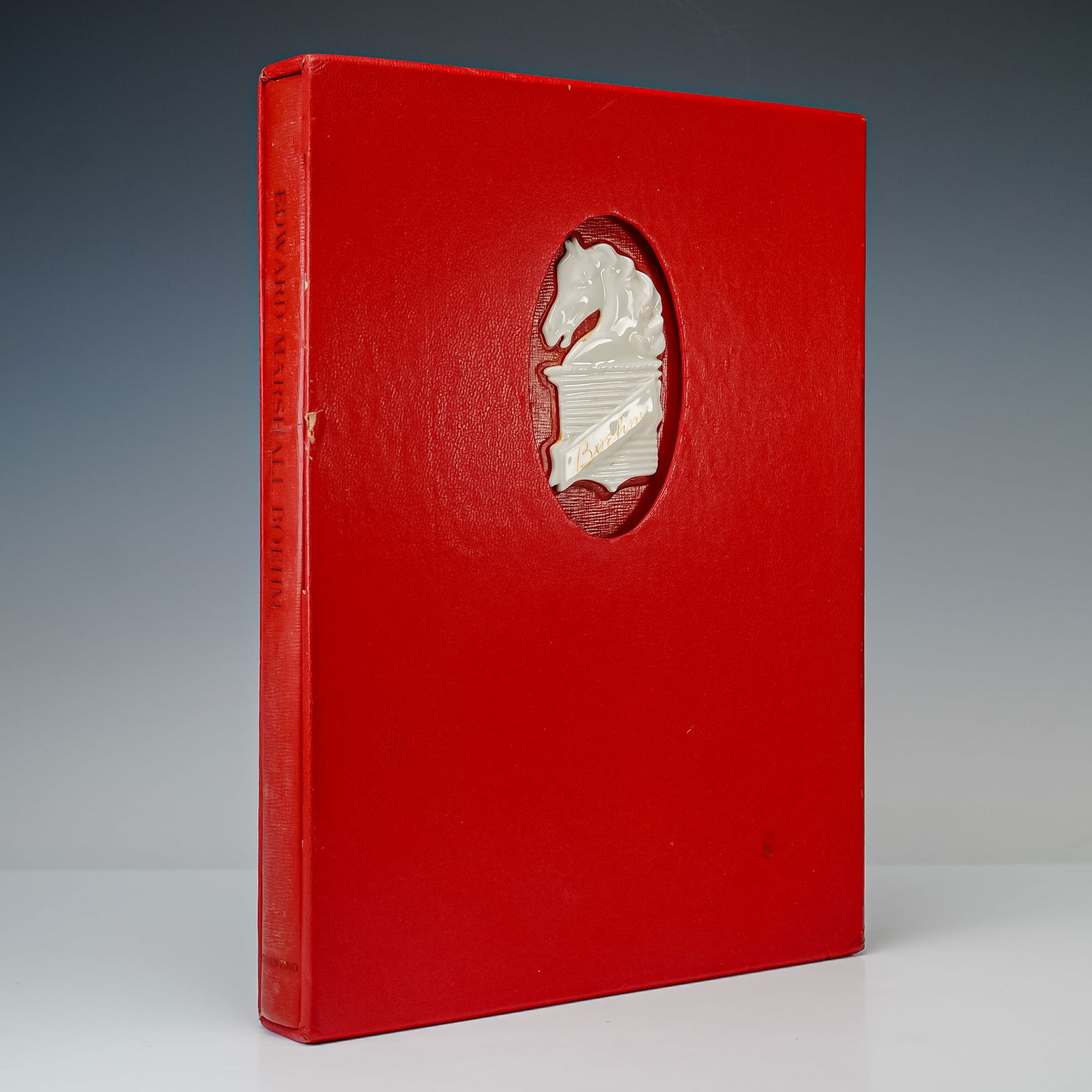 1st Ed. Signed Frank Cosentino Book, Edward Marshall Boehm 1913-1969: Chicago: The Lakeside Press, 1970. Bound in red leather hardcover and housed in a matching slipcase with a circular cutout to present the front cover displays - a white porcelain Boehm horse's head em