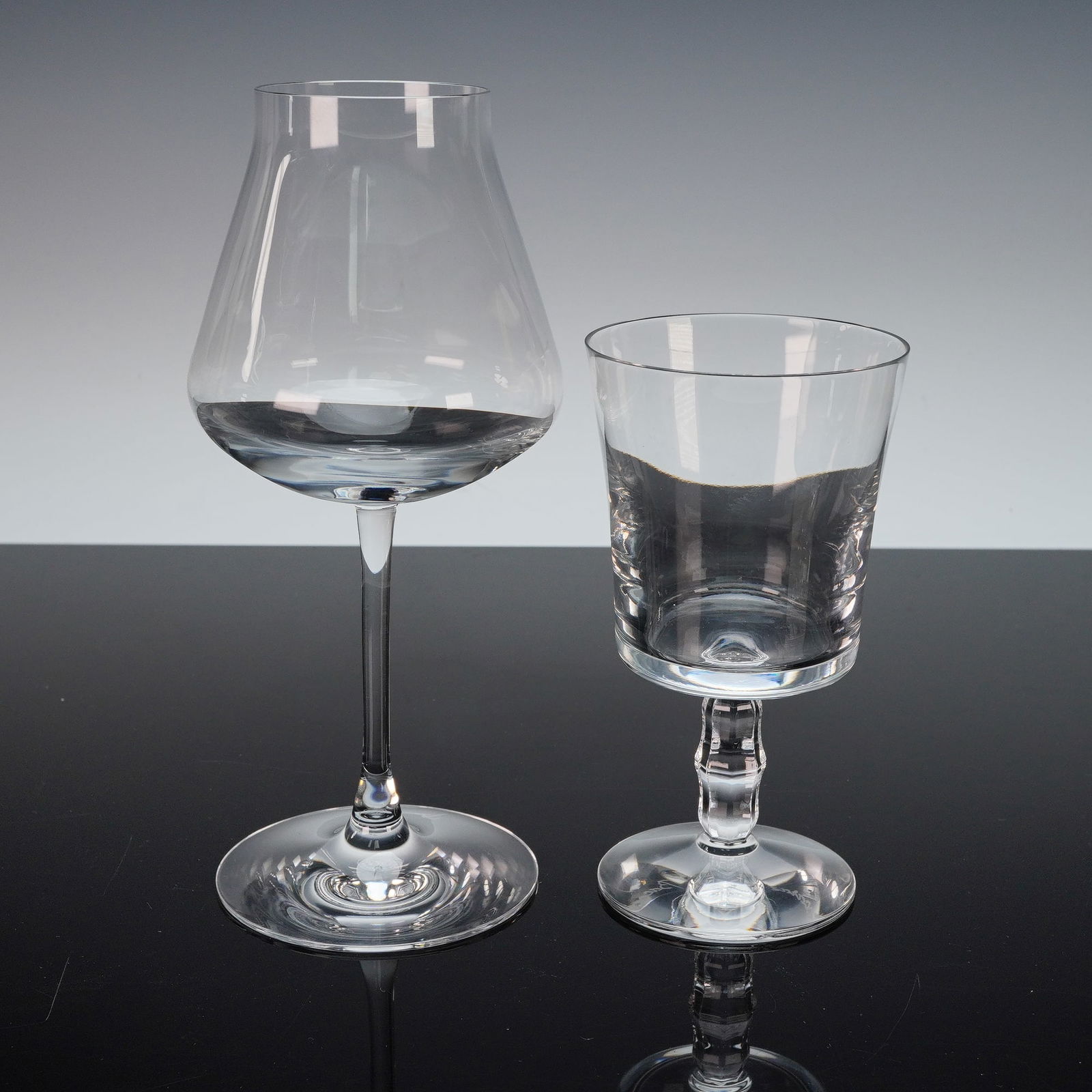 3pc Baccarat Crystal Wine Glass and Water Goblets: Including one small wine glass with a straight-sided bowl and slender stem, one large water goblet with a rounded bowl and wide foot for stability, and one tall wine glass with a tapered bowl and elon