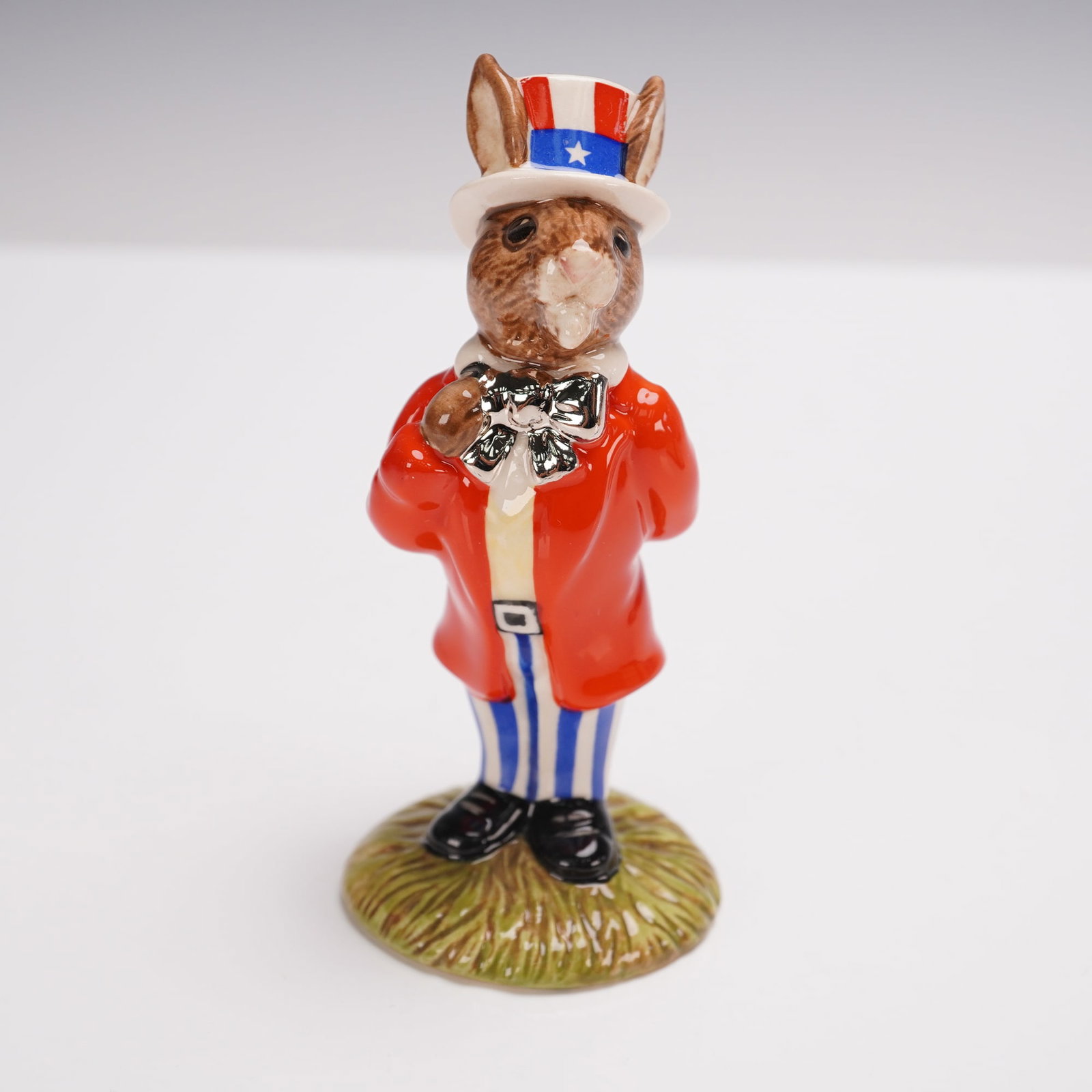 Royal Doulton Bunnykins Figurine, Uncle Sam DB175: Royal Doulton Bunnykins figurine titled Uncle Sam DB175, designed in a special new colourway issued in 1997 to commemorate the 10th Anniversary of the New England Chapter of the Royal Doulton Internat