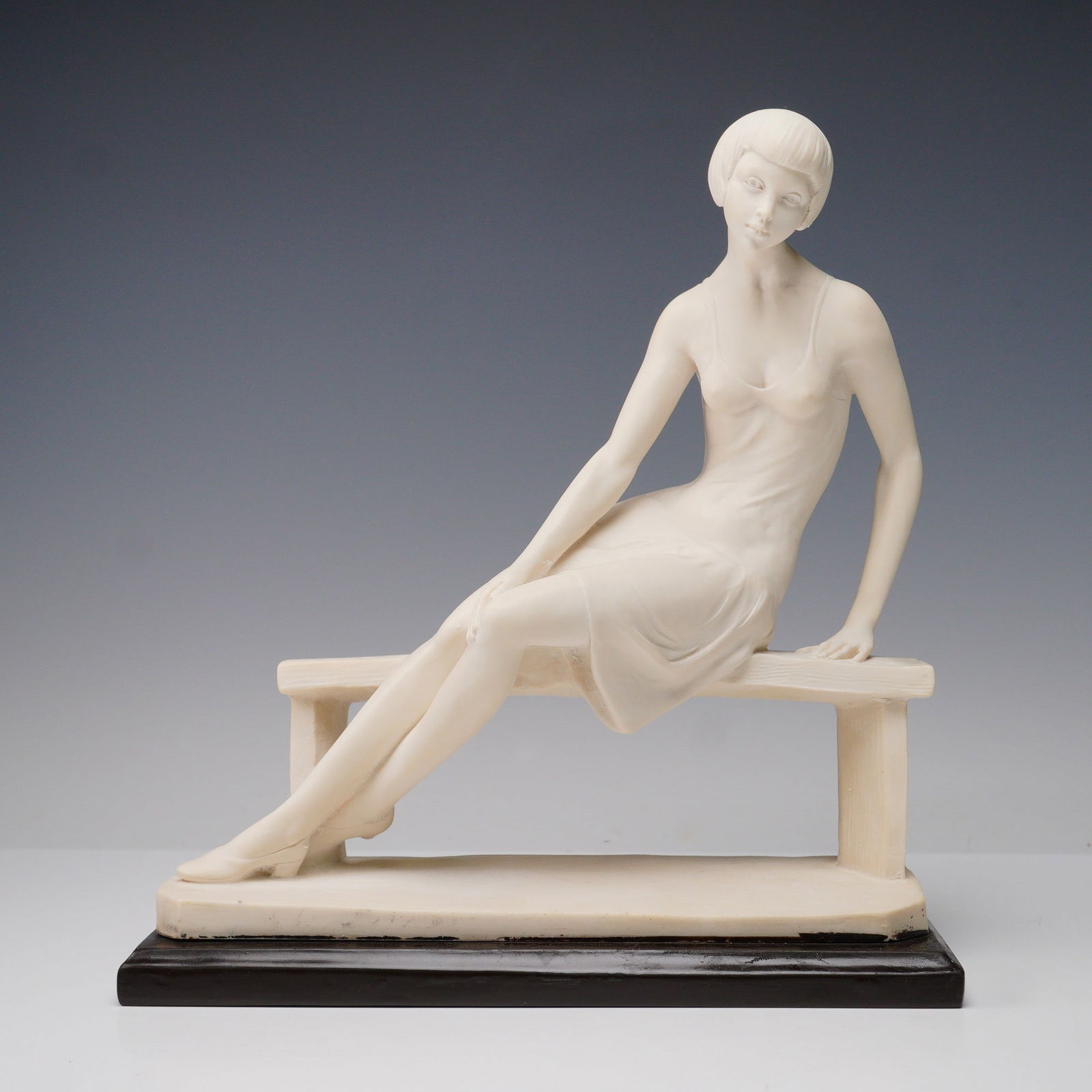 A. Santini Sculpture, Young Woman on a Bench: Signed A. Santini sculpture depicting a young woman seated gracefully on a bench, wearing a simple dress and posed with one leg extended. Crafted of molded marble dust and resin, the signature medium