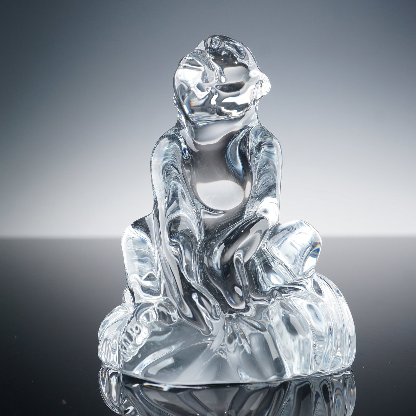 Baccarat Crystal Chinese Zodiac Animal Figurine, Monkey: Baccarat crystal Chinese Zodiac figurine, Monkey, featuring a clear crystal seated monkey with smooth, fluid contours and delicately rendered facial features. Created to celebrate the Chinese Year of 