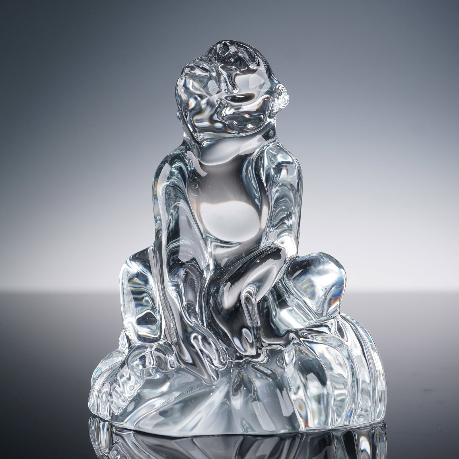 Baccarat Crystal Chinese Zodiac Animal Figurine, Monkey: Baccarat crystal Chinese Zodiac figurine, Monkey, featuring a clear crystal seated monkey with smooth, fluid contours and delicately rendered facial features. Created to celebrate the Chinese Year of 