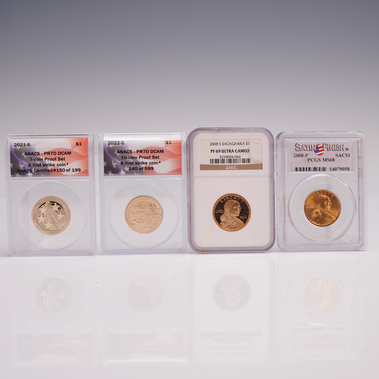 4pc 2008-2022 Sacagawea One Dollar Coins NGC, PCGS, and ANACS Graded: A group of four certified United States one-dollar coins spanning both the Sacagawea and Native American series, each professionally graded and encapsulated. Included are 2008-S Sacagawea NGC graded P