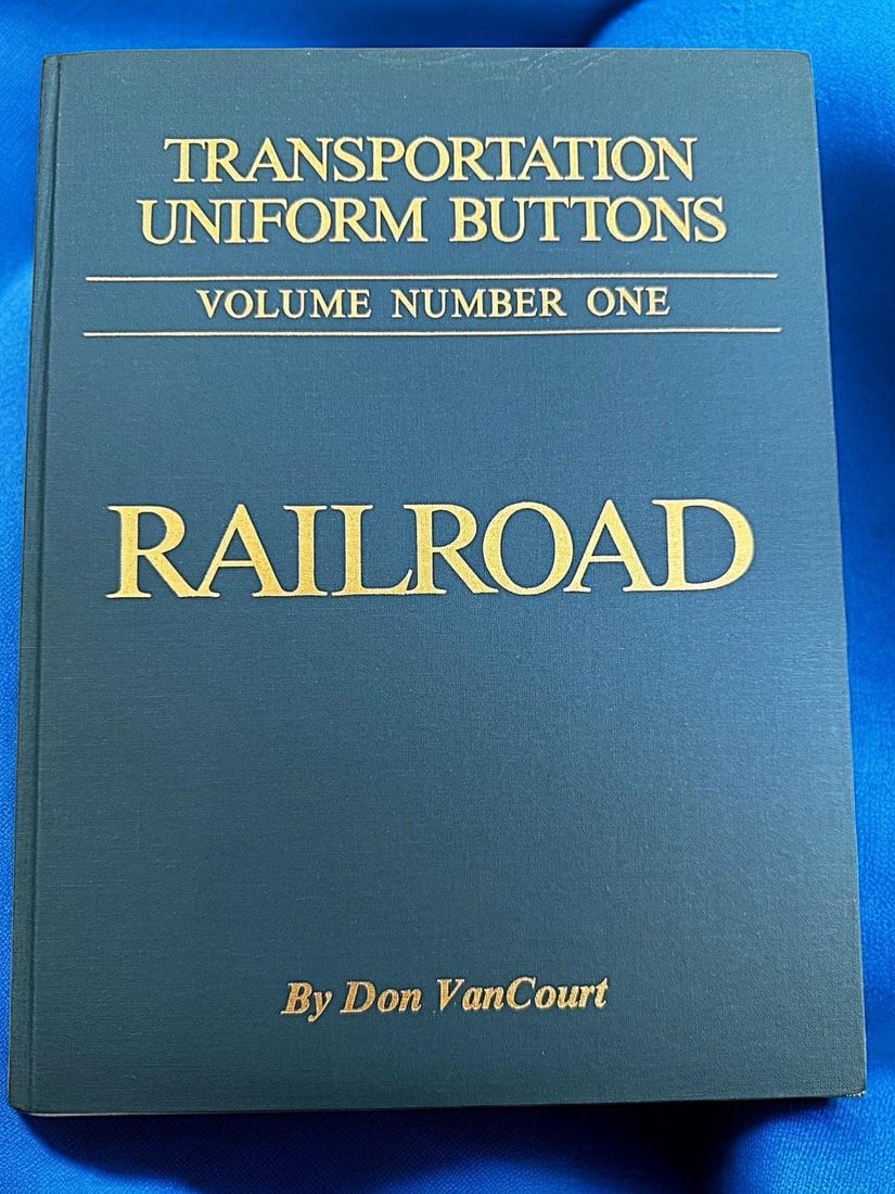 A book on railroad buttons
