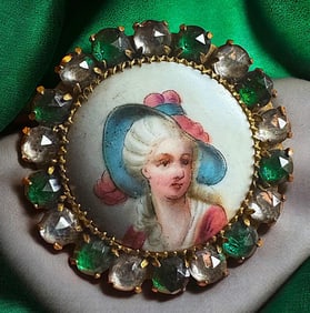 A small card of division three studio artist buttons