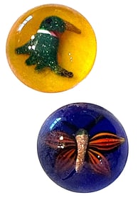A small card of studio artist glass buttons
