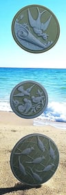 A small card of division three studio artist buttons