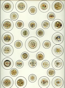 A card of division three glass buttons.